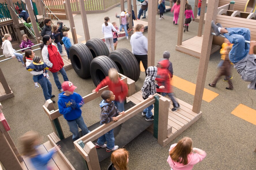 Children play in the newly opened Dover Aux Field at Liberty Park, April 22, 2011 at Dover Air Force Base, Del. (U.S. Air Force photo by Steve Kotecki) 