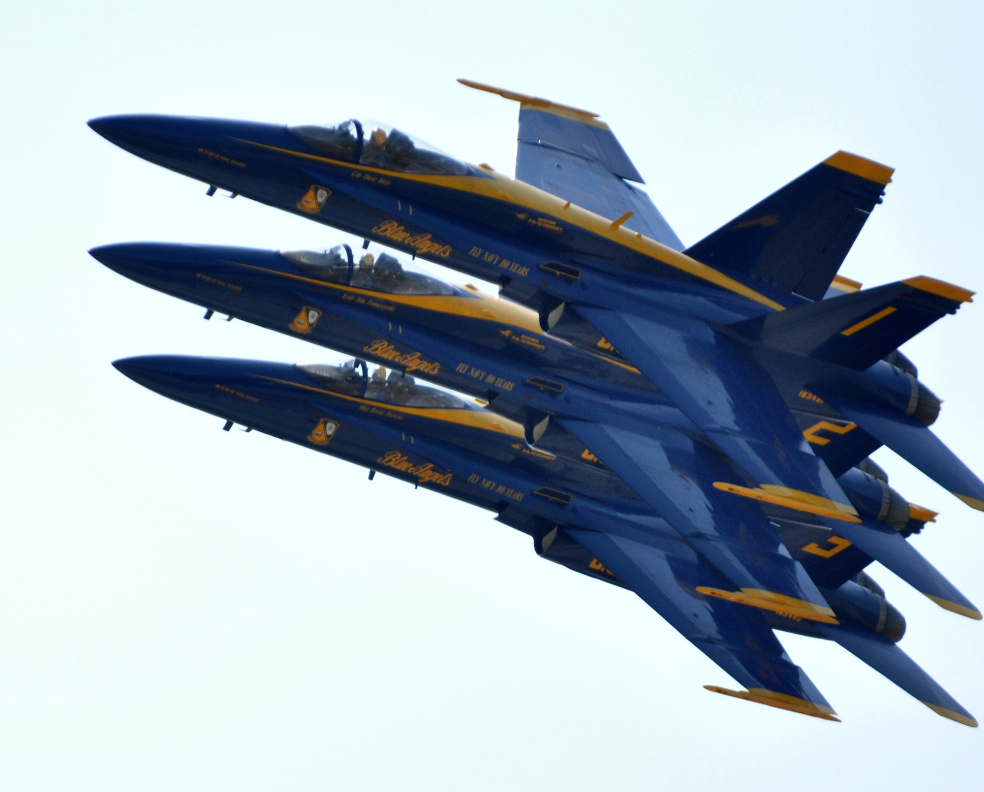 Three of the U.S. Navy's Blue Angels flight-demonstration team fly over the 2011 Air Power Expo in an echelon formation, April 17, at Naval Air Station Fort Worth Joint Reserve Base, Texas.  (U.S. Air Force photo/Lt. Col. David Kurle)