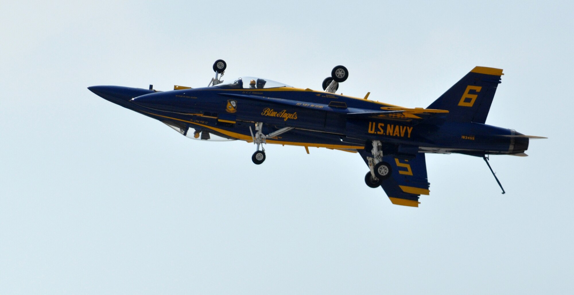 Blue Angels pilots Navy Lts. Ben Walborn and C.J. Simonsen perform a "mirror image" fly-by April 17 during the 2011 Air Power Expo at Naval Air Station Fort Worth Joint Reserve Base, Texas.  (U.S. Air Force photo/Lt. Col. David Kurle) 