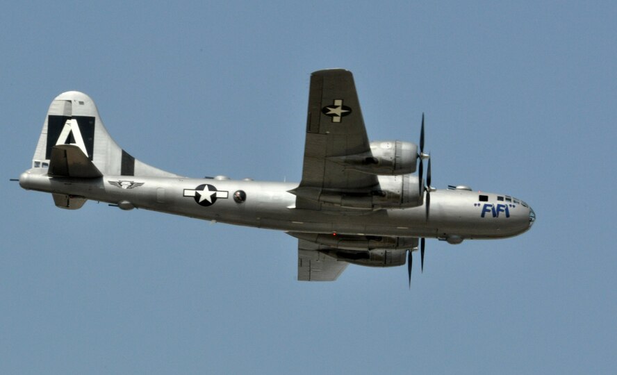 A World War II-era B-29 Superfortress bomber passes over Air Expo 2011, April 17, at Naval Air Station Fort Worth Joint Reserve Base, Texas.  More than 200,000 people were expected at the two-day airshow held April 16-17.  The B-29 is maintained and operated by the Commemorative Air Force.  (U.S. Air Force photo/Lt. Col. David Kurle)