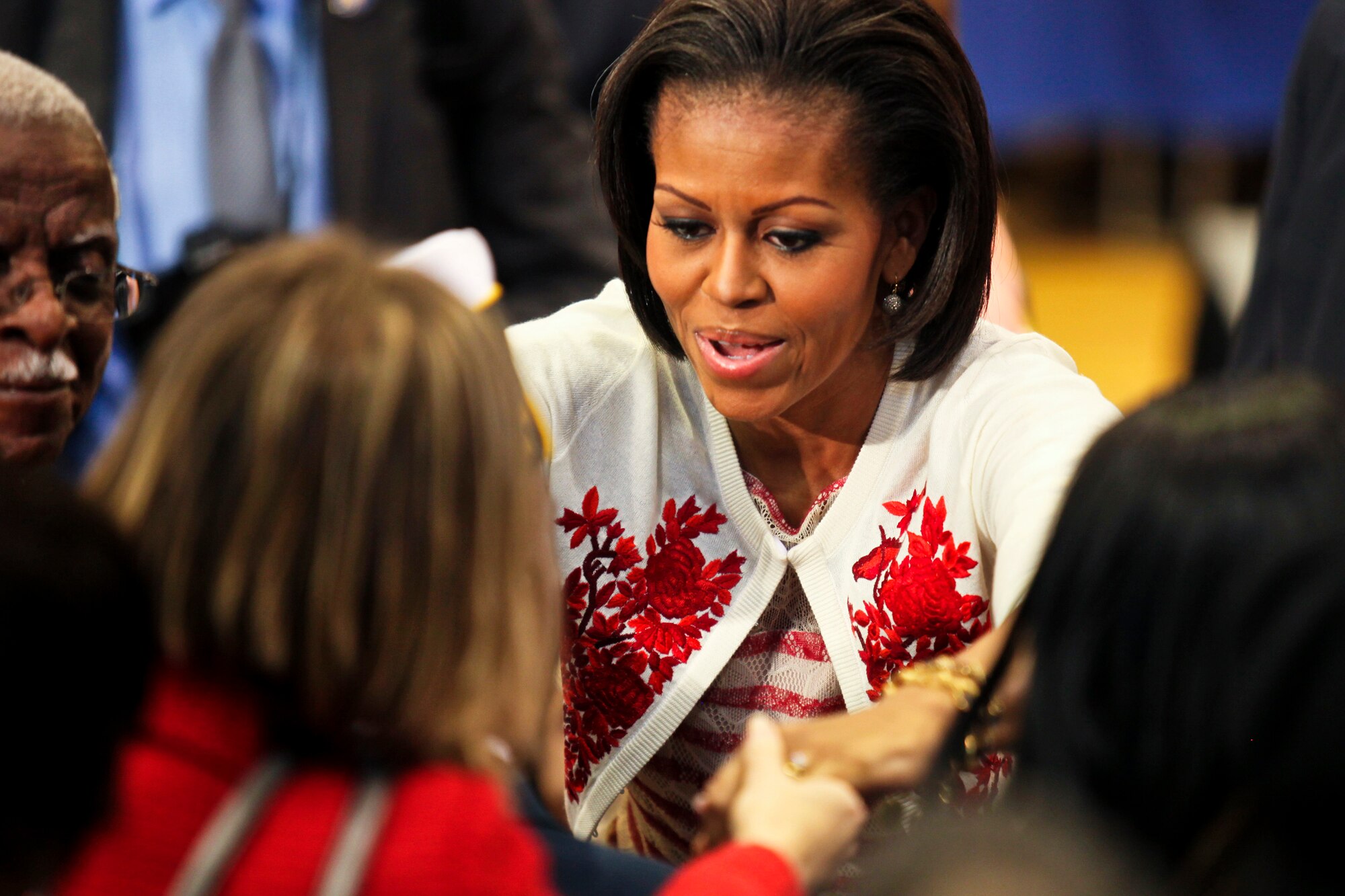 First Lady Michelle Obama greets a member of the Camp Lejeune community April 13, 2011, during the "Joining Forces" campaign kickoff at Camp Lejeune, N.C. The White House launched the campaign to raise awareness about the challenges facing military families and to urge all Americans to support them. (U.S. Marine Corps photo/Lance Cpl. Damany S. Coleman)