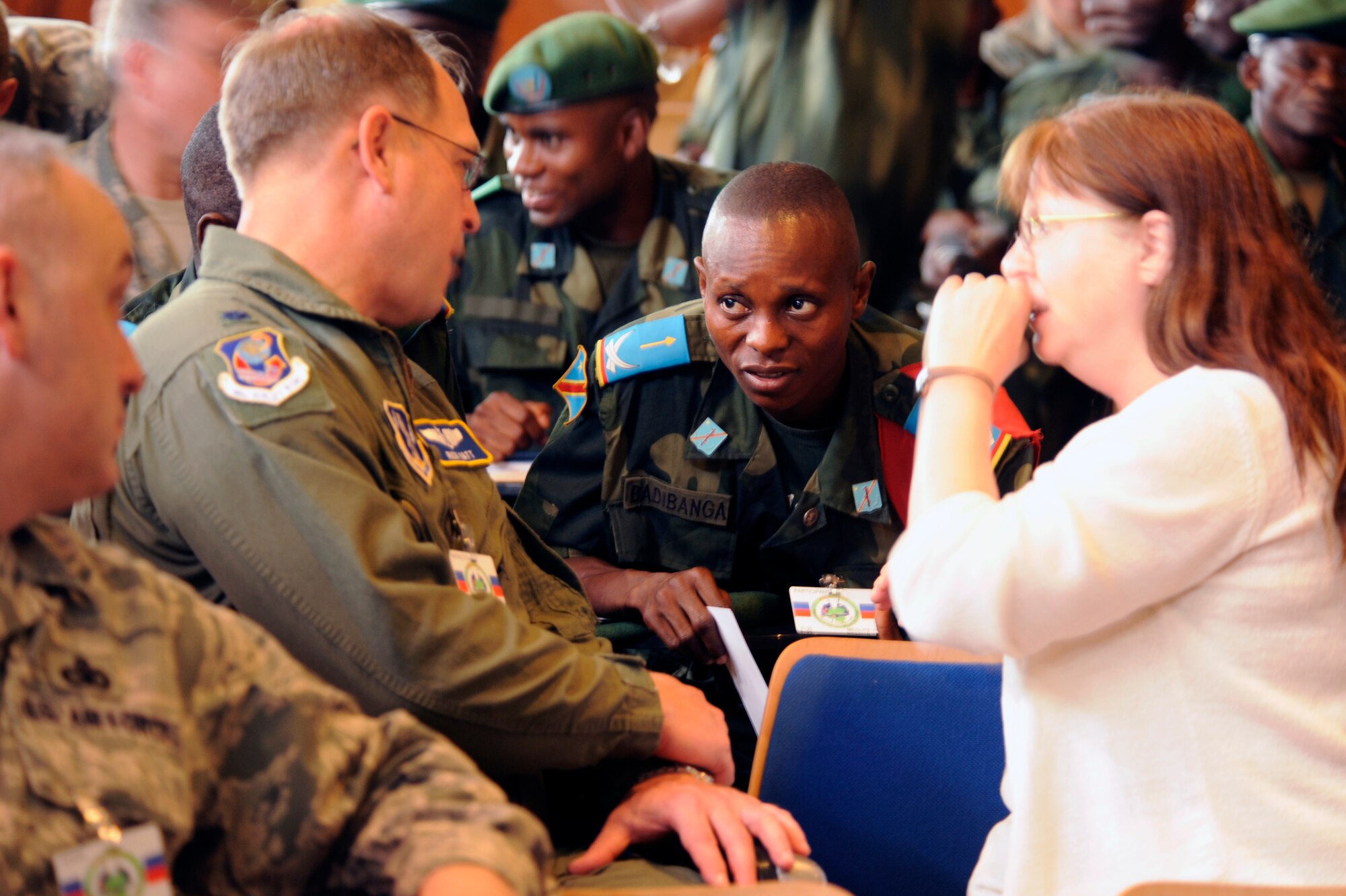 KINSHASA, Democratic Republic of the Congo ? U.S. Air Force and Democratic Republic of the Congo personnel speak before the opening ceremonies for the MEDLITE 11 exercise, April 25, 2011. MEDLITE 11 is a joint medical exercise focused on aeromedical evacuation, to improve the readiness of U.S. Air Force and DRC personnel. (U.S. Air Force photo by Tech. Sgt. Todd Wivell)

