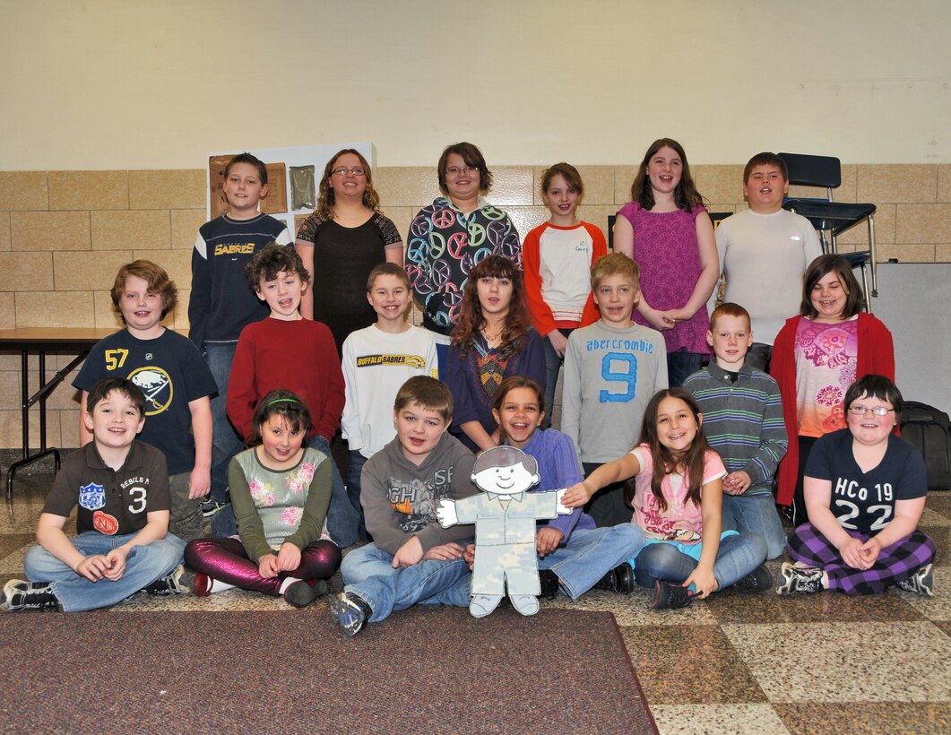 Students from Kaegebein Elementary School pose with Airman Flat Stanley April 6, 2011, Niagara Falls NY. Grade school students around Niagara County, NY were visited by Airmen of the 914th Airlift Wing and their special friend Flat Stanley. (U.S. Air Force photo by Staff Sgt. Joseph McKee)