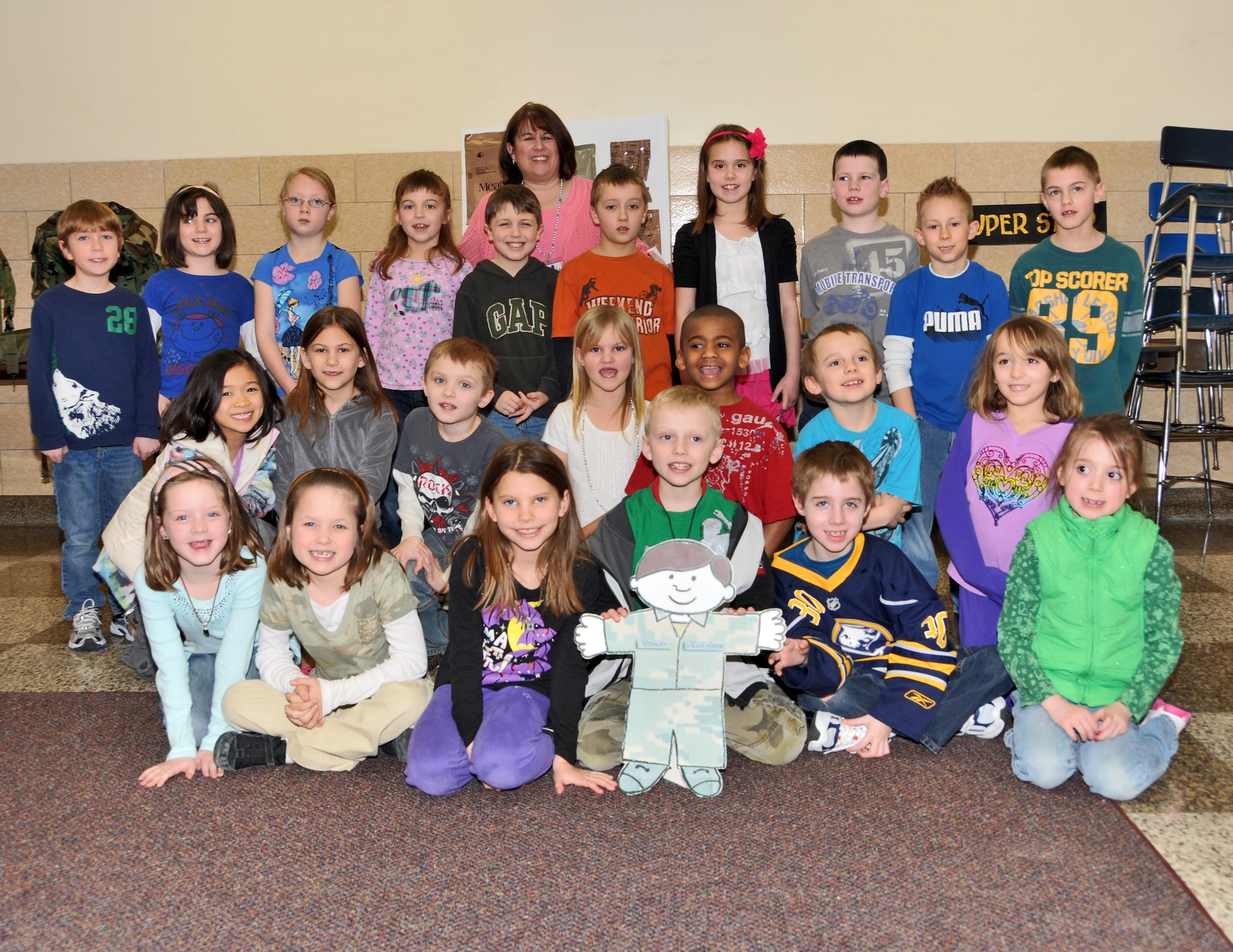 Students from Kaegebein Elementary School pose with Airman Flat Stanley April 6, 2011, Niagara Falls NY. Grade school students around Niagara County, NY were visited by Airmen of the 914th Airlift Wing and their special friend Flat Stanley. (U.S. Air Force photo by Staff Sgt. Joseph McKee)