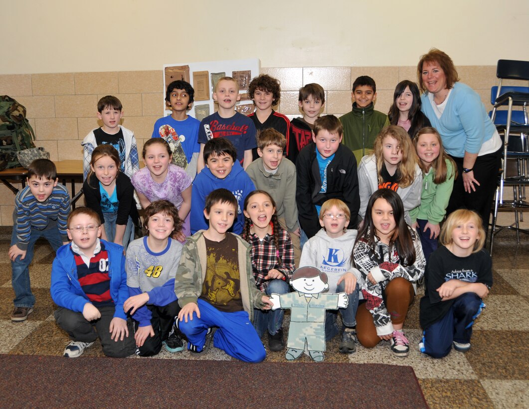 Students from Kaegebein Elementary School pose with Airman Flat Stanley April 6, 2011, Niagara Falls NY. Grade school students around Niagara County, NY were visited by Airmen of the 914th Airlift Wing and their special friend Flat Stanley. (U.S. Air Force photo by Staff Sgt. Joseph McKee)