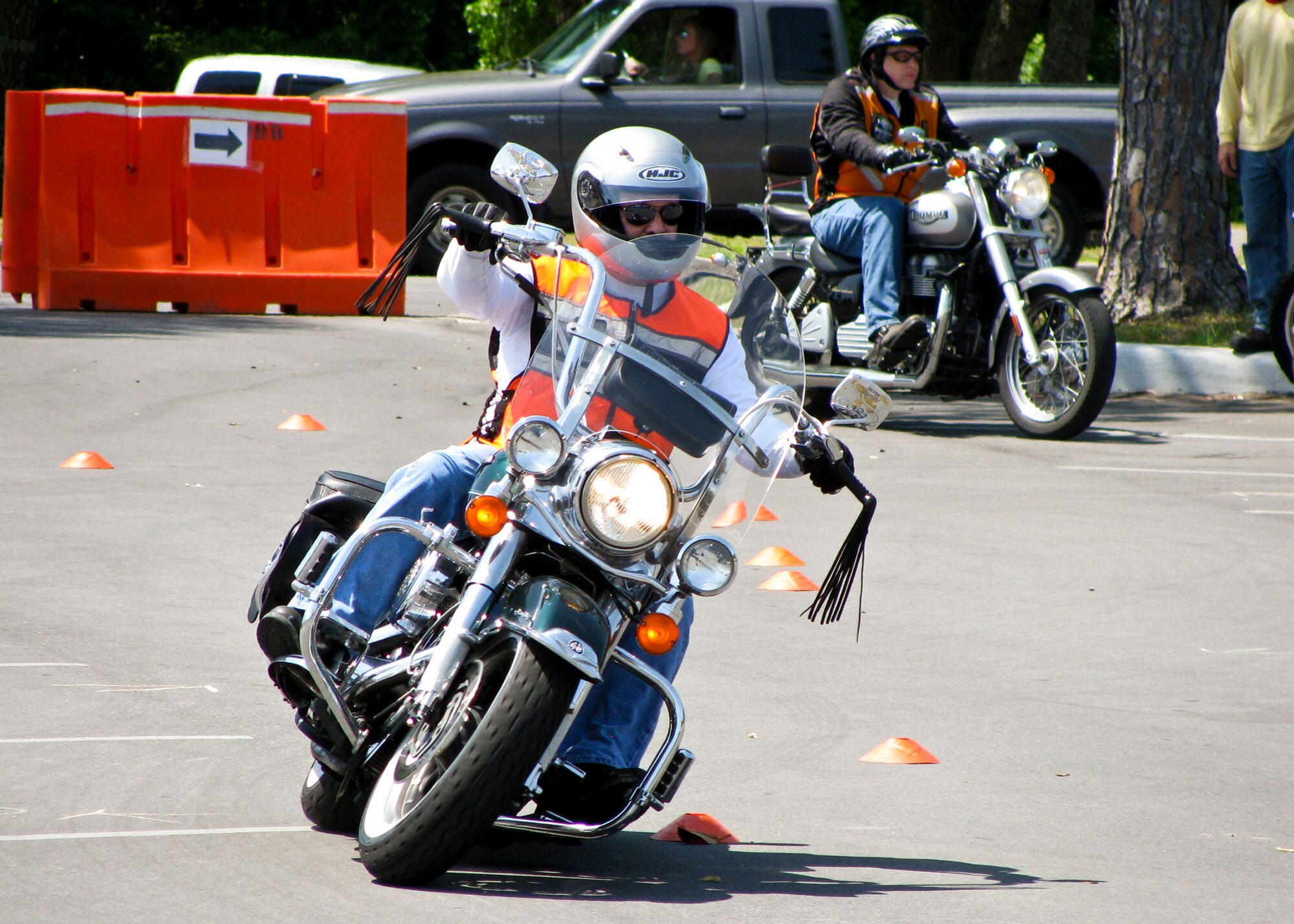 A rider takes his motorcycle through a series of turns at Eglin’s Motorcycle Safety Day event, April 21.  The event brought out more than 600 riders to participate in safety discussions, a riding skills course and group ride. (U.S. Air Force photo/Irene Freiberg)