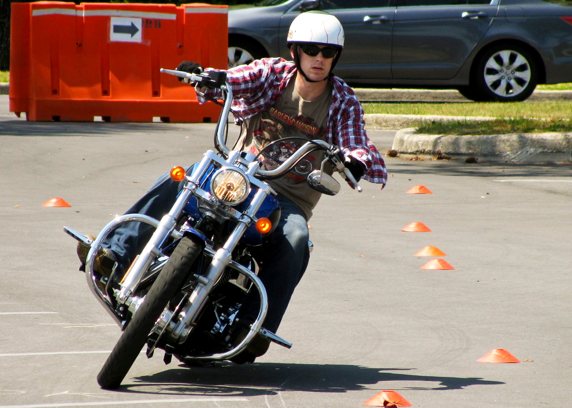 A rider takes his motorcycle through a series of turns at Eglin’s Motorcycle Safety Day event, April 21.  The event brought out more than 600 riders to participate in safety discussions, a riding skills course and group ride. (U.S. Air Force photo/Irene Freiberg)
