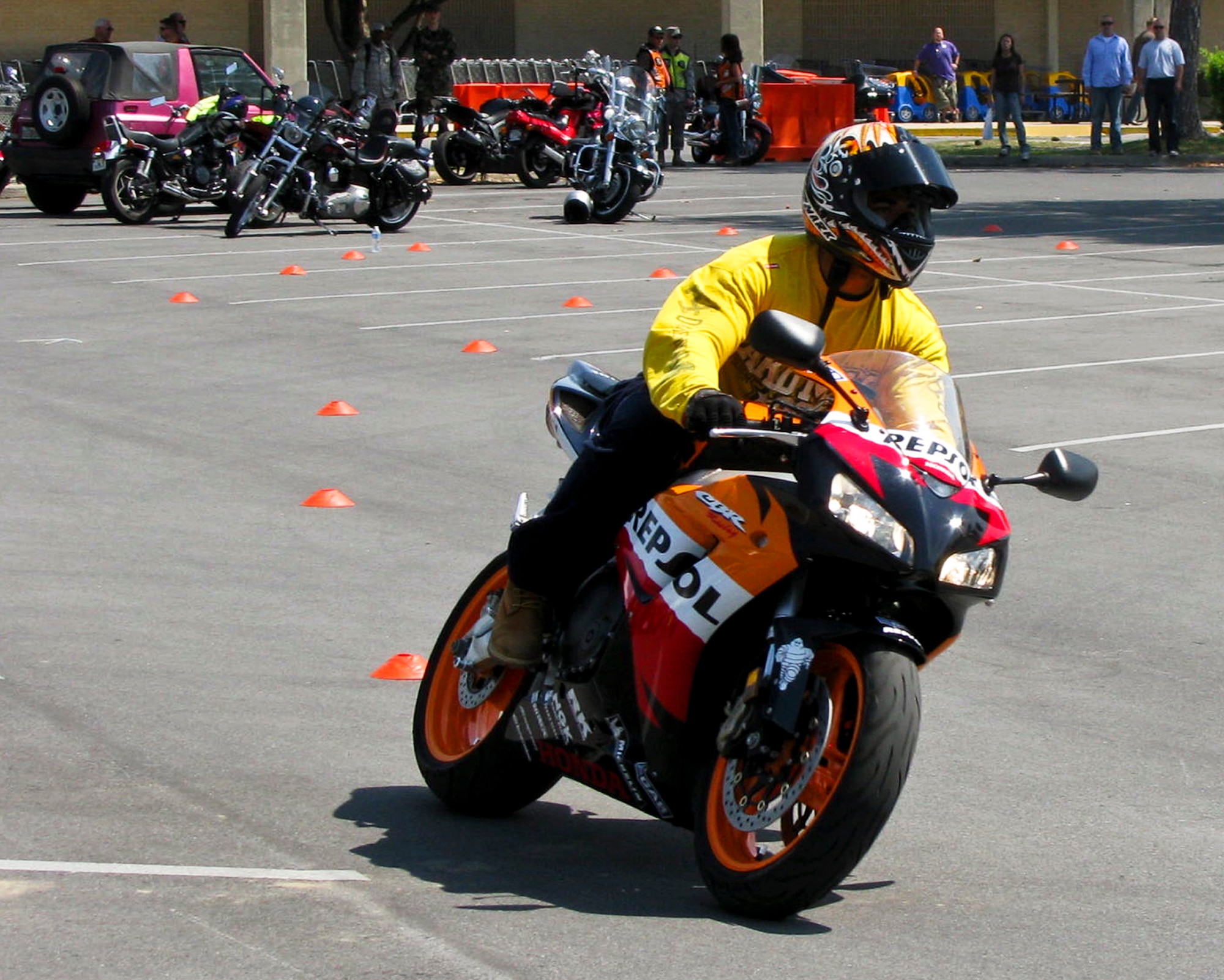 A rider takes his motorcycle through a series of turns at Eglin’s Motorcycle Safety Day event, April 21.  The event brought out more than 600 riders to participate in safety discussions, a riding skills course and group ride. (U.S. Air Force photo/Irene Freiberg)