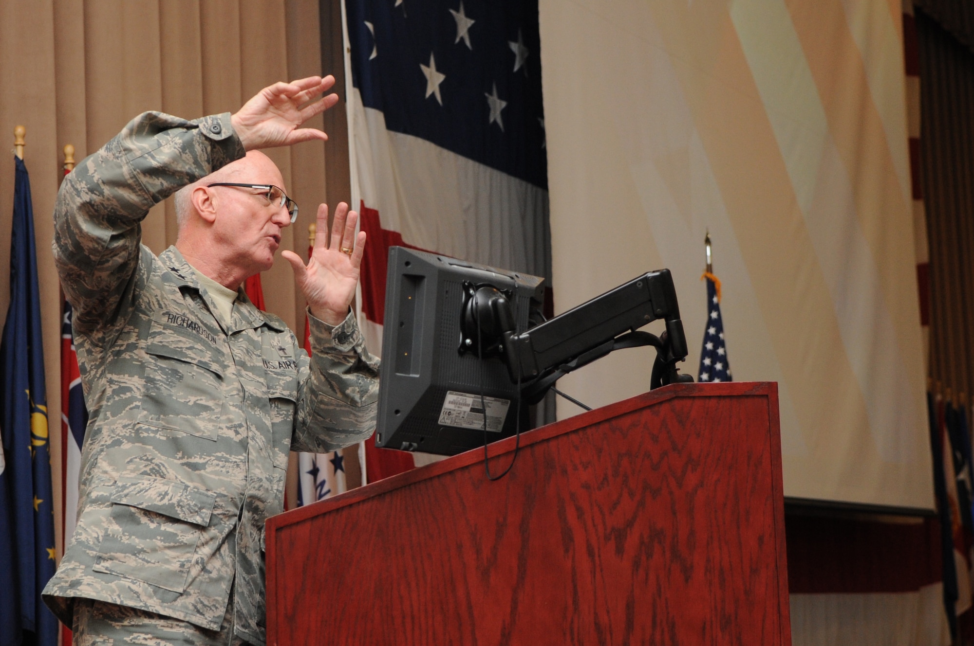 Chief of Air Force Chaplains Maj. Gen. Cecil Richardson speaks to Airmen at the National Prayer Luncheon held on Barksdale Air Force Base, La., April 20. The chaplain used a few of his own life experiences as an example to inspire Airmen. The Barksdale Chapel offers many services to Airmen and their families. To find out more information about services offered, contact the base chapel at 456-2111 or 456-2466. (U.S. Air Force photo/Airman 1st Class Micaiah Anthony)(RELEASED) 