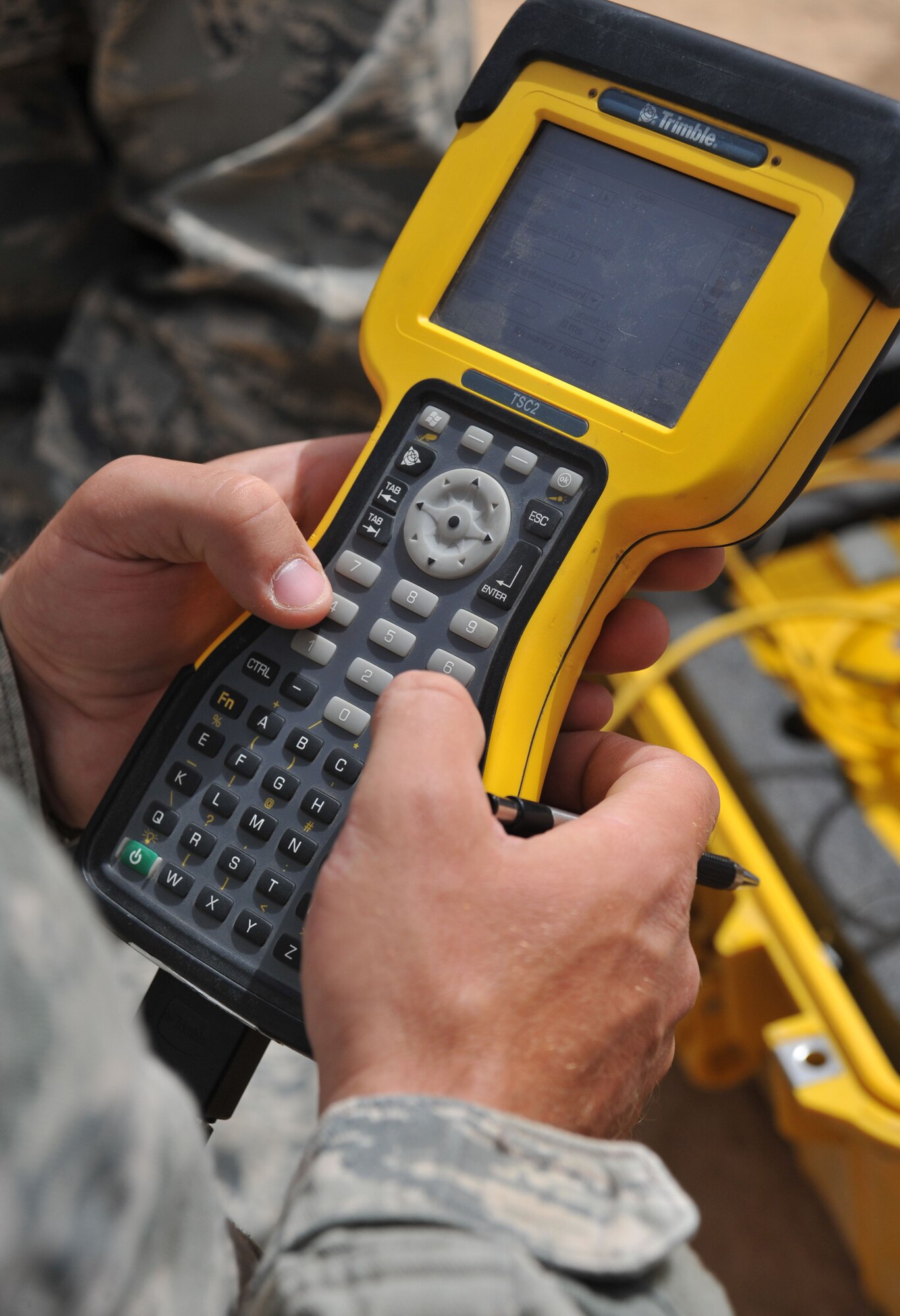 Tech. Sgt. James Gray, a Facilities Engineer Team engineering assistant, uses site surveying equipment April 13, 2011, at Contingency Operating Site Marez. The Marez team produces statements of work, plans and specifications for projects as well as surveying and mapping for several bases across northern Iraq. Sergeant Gray is a Leon, Kan., native deployed from Spangdahlem Air Base, Germany. (U.S. Air Force photo by Senior Airman Andrew Lee/Released)