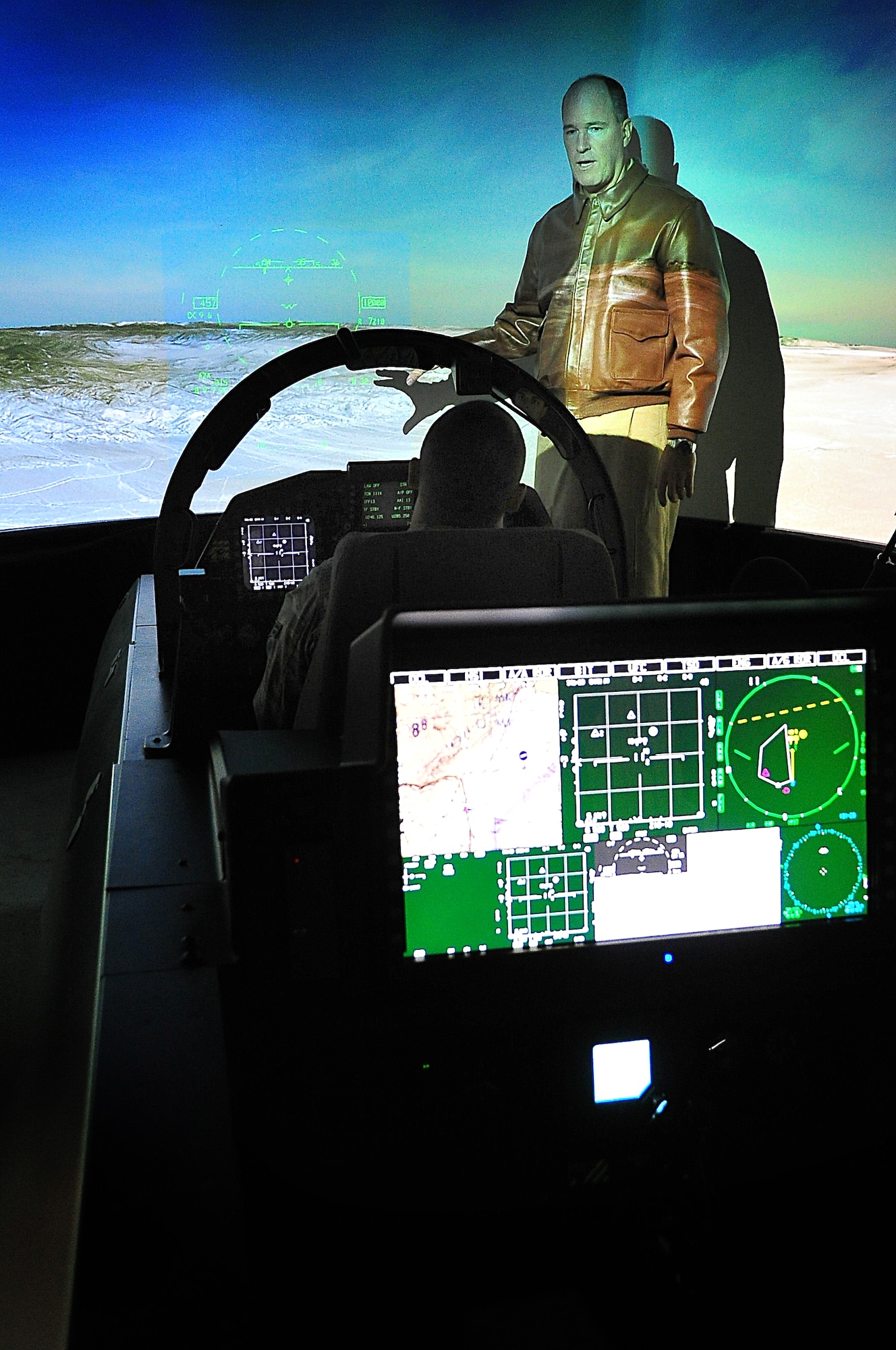 Boeing made available a F-15K simulator with 180 degree display to Osan Air base, Republic of Korea, personnel , April 25. Loaded with realistic scenarios, the simulator gave a real feel to the operator enabling Airmen to hop in the cockpit and take out enemy aircraft as well as bomb labeled facilities. The F-15 was armed with two laser guided missiles and one bomb for each mission.  After each mission Airmen rotated out and discussed amongst each other how difficult flying is. (U.S. Air Force Photo by/ Staff Sgt. Daylena Gonzalez)