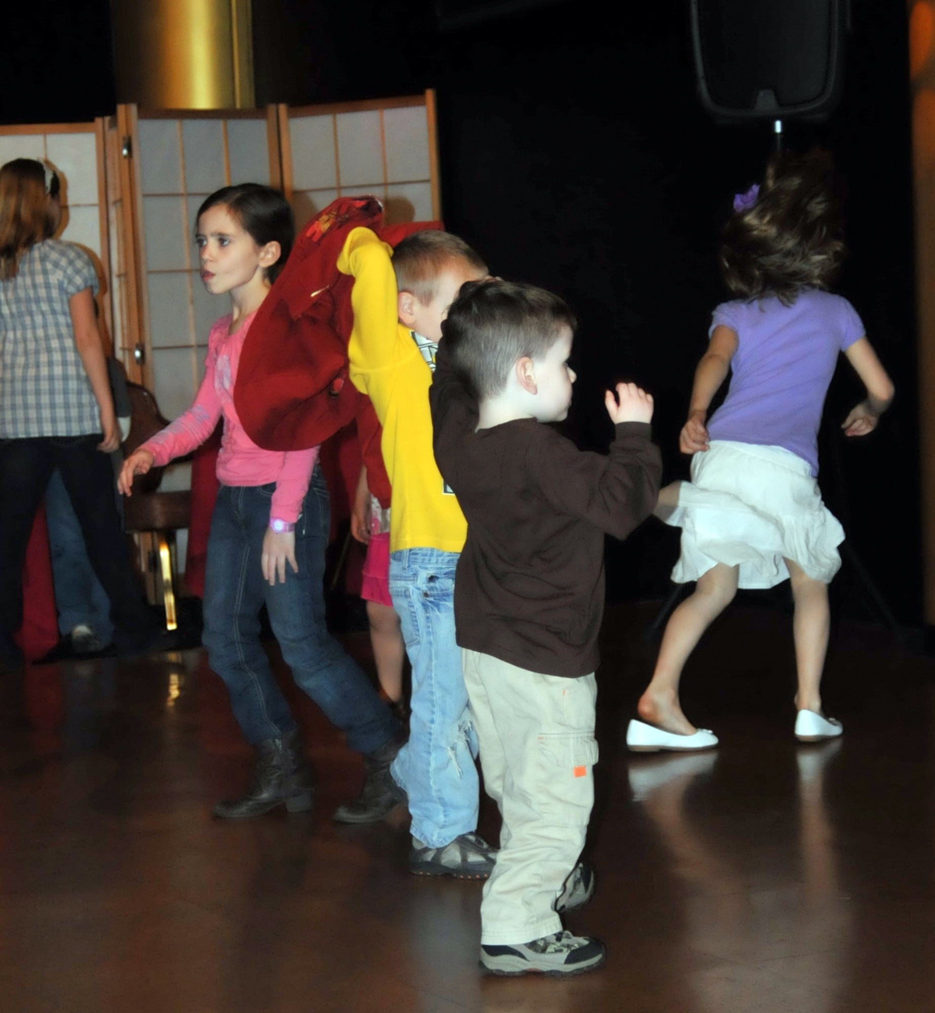 YOKOTA AIR BASE, Japan -- Kids dance at the "Shake your booty not your baby" event held at the enlisted club, Yokota Air Base, Japan, April 22, 2011. The event, part of Child Abuse Prevention month, raised awareness of Shaken Baby Syndrome. (U.S. Air Force photo/Airman 1st Class Krystal M. Garrett)