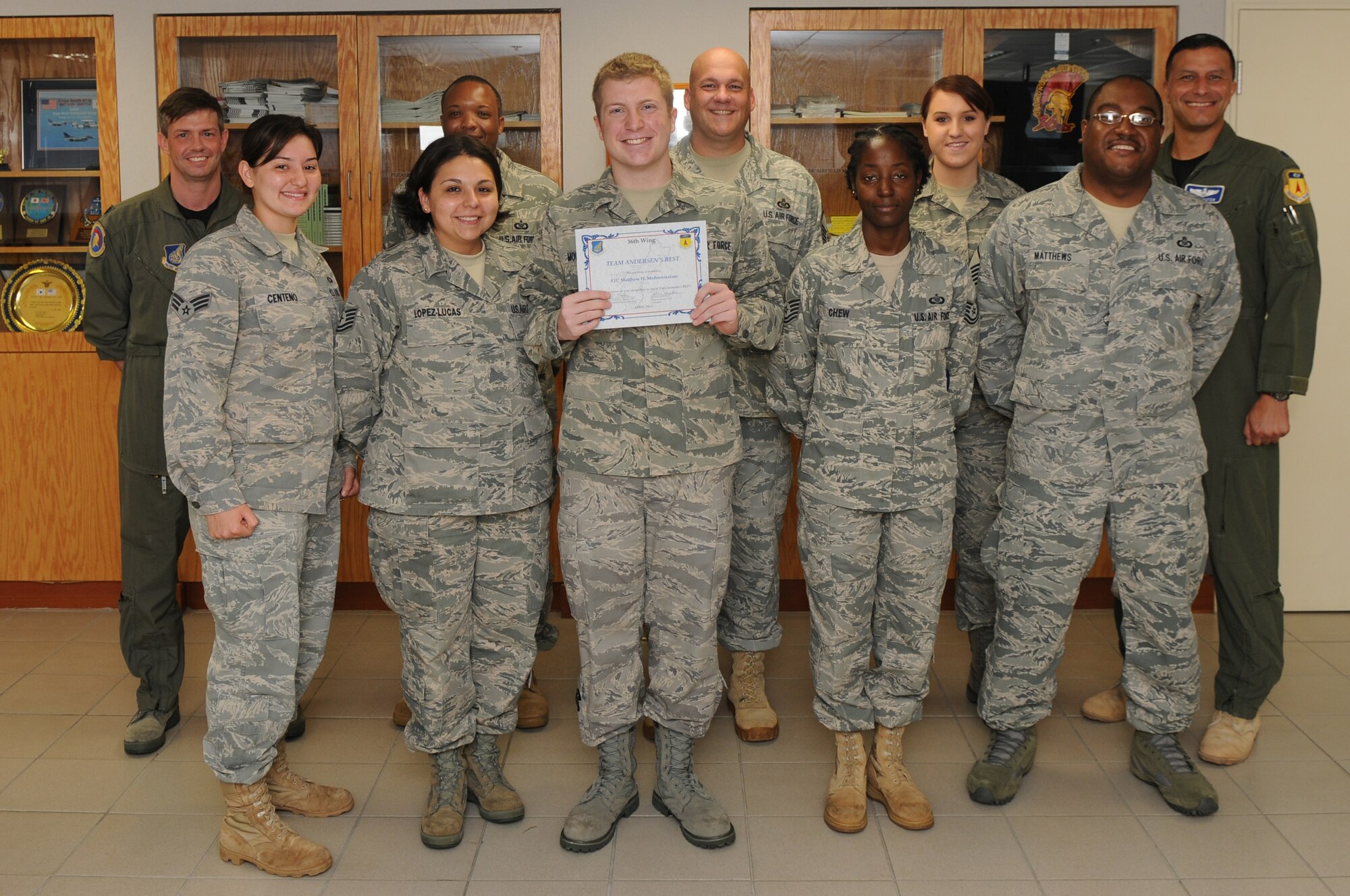 Airman First Class Matthew Mohrenweiser, 36th Operations Support Squadron Airfield Management shift lead, was awarded Andersen's Best by Brig. Gen. John Doucette, 36th Wing commander, here April 20.(U.S. Air Force photo/Senior Airman Carlin Leslie)