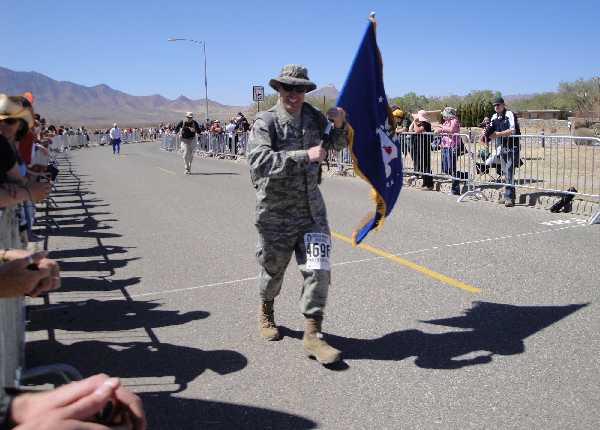 2nd Lt. Aaron Tissot from the 354th Force Support Squadron crosses the finish line at the 22nd Annual Bataan Memorial Death March held March27, 2011, White Sands Missile Range, New Mexico.  The march honors the more than 75,000 American and Filipino soldiers who surrenedered to Japanese forces April 9, 1942, and were forced to march 61 miles as Prisoners of War.  (Courtesy Photo)               