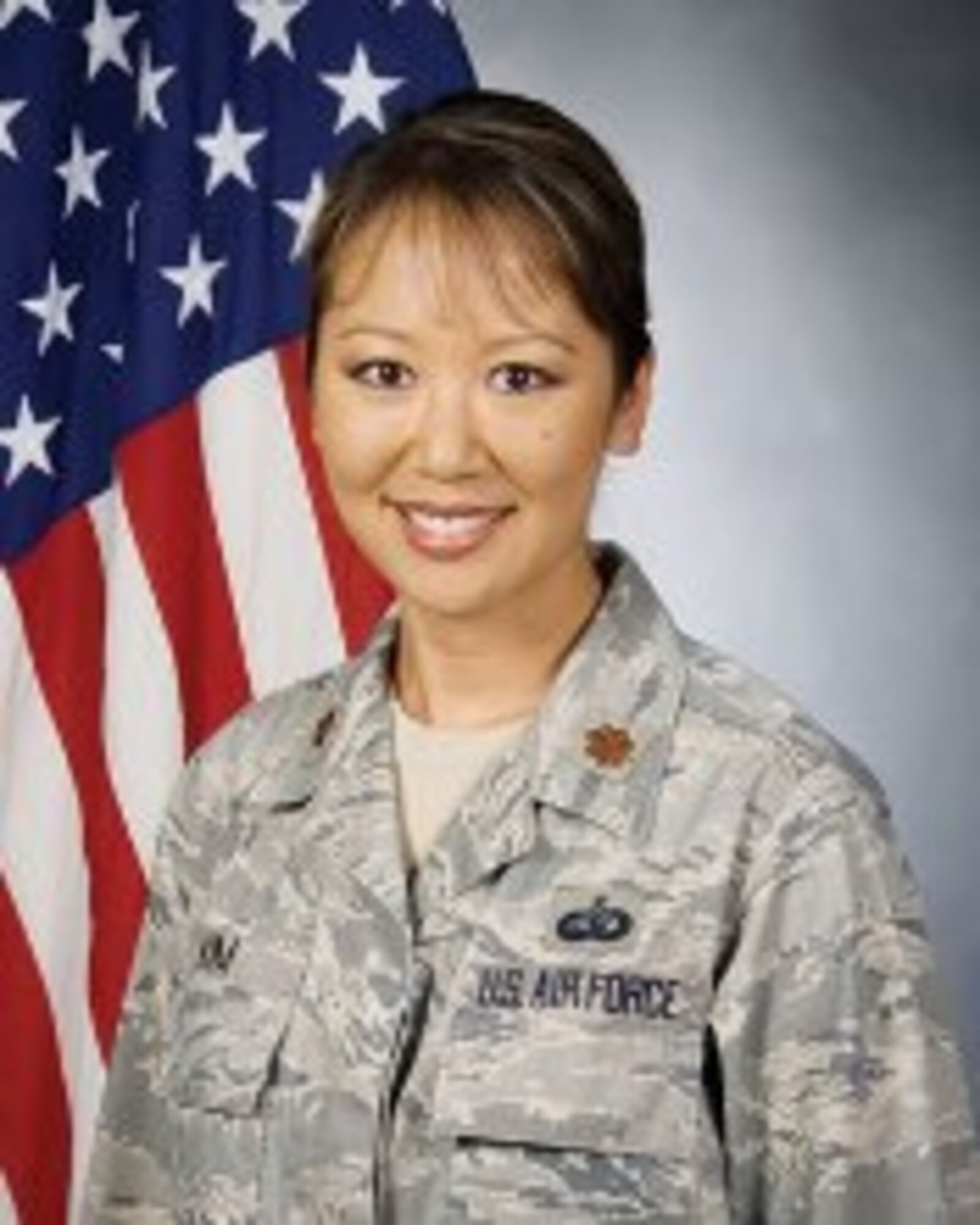 Maj. Angela Kim,
8th Force Support Squadron commander