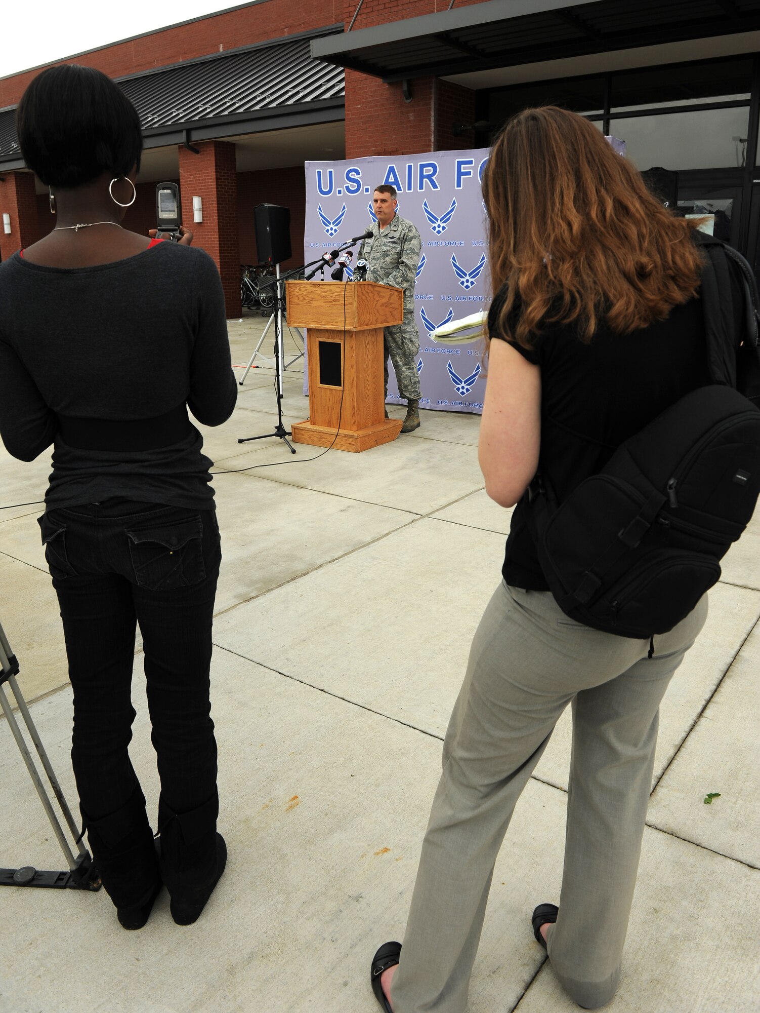 Col. Mike Minihan, 19th Airlift Wing commander, speaks with local media members April 26, 2011, at Little Rock Air Force Base, Ark., and answers questions about the base’s post-tornado recovery efforts. A tornado struck the base at approximately 8 p.m. April 25. (U. S. Air Force photo by Airman 1st Class Rusty Frank)