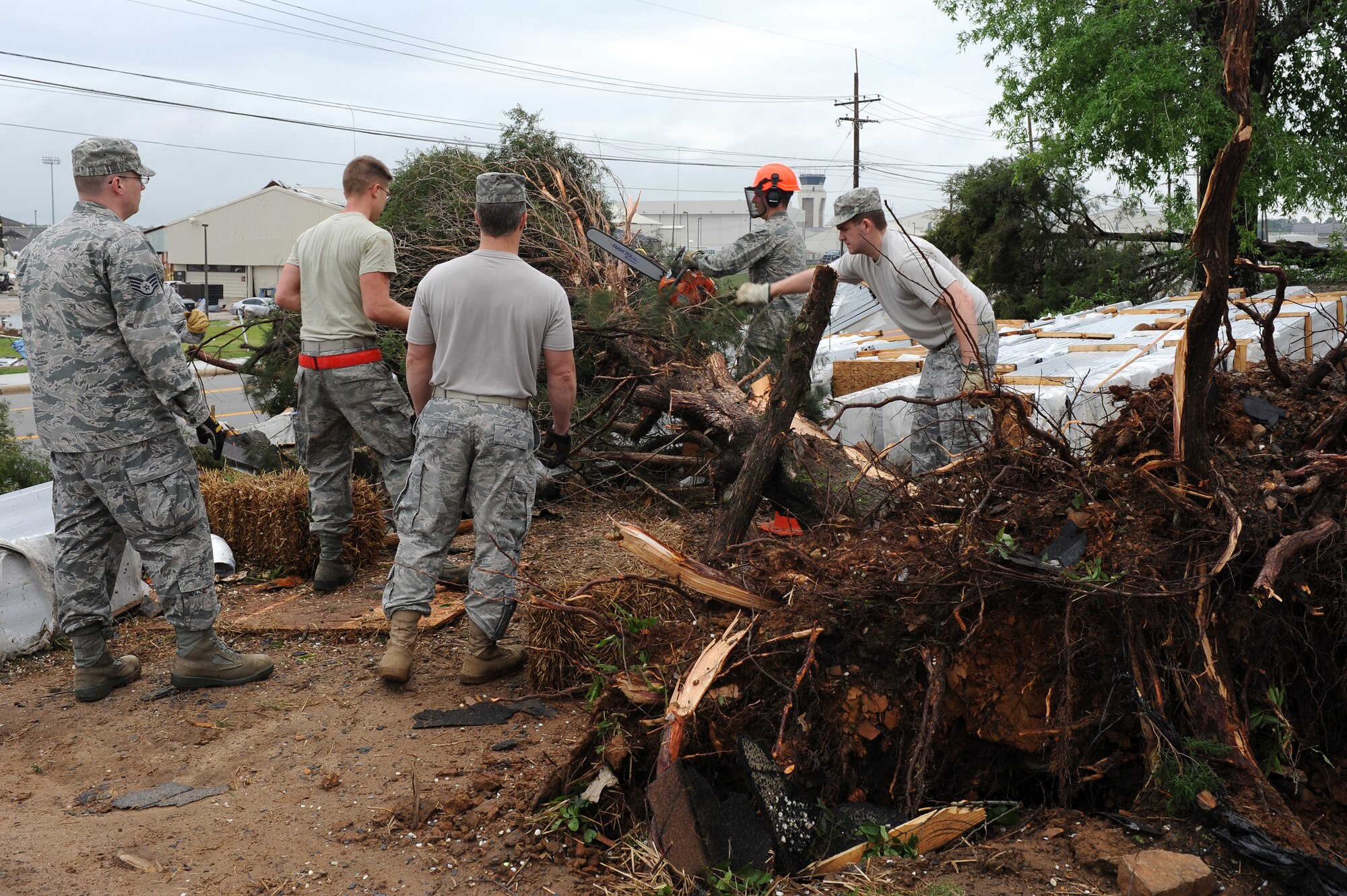 Members of Team Little Rock respond to a real-world natural disaster April 26, 2011, at Little Rock Air Force Base, Ark. A tornado struck the base at approximately 8 p.m. April 25.  (U. S. Air Force photo by Airman 1st Class Rusty Frank)