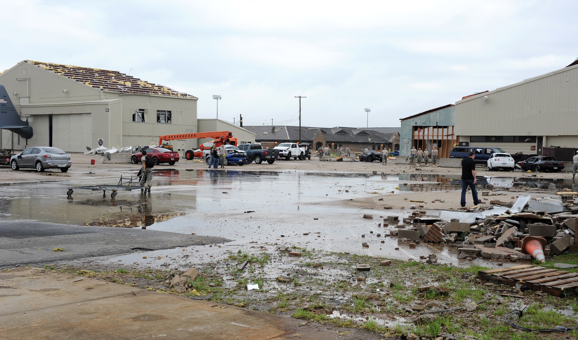 Members of Team Little Rock respond to a real-world natural disaster April 26, 2011, at Little Rock Air Force Base, Ark. A tornado struck the base at approximately 8 p.m. April 25.  (U. S. Air Force photo by Airman 1st Class Rusty Frank)