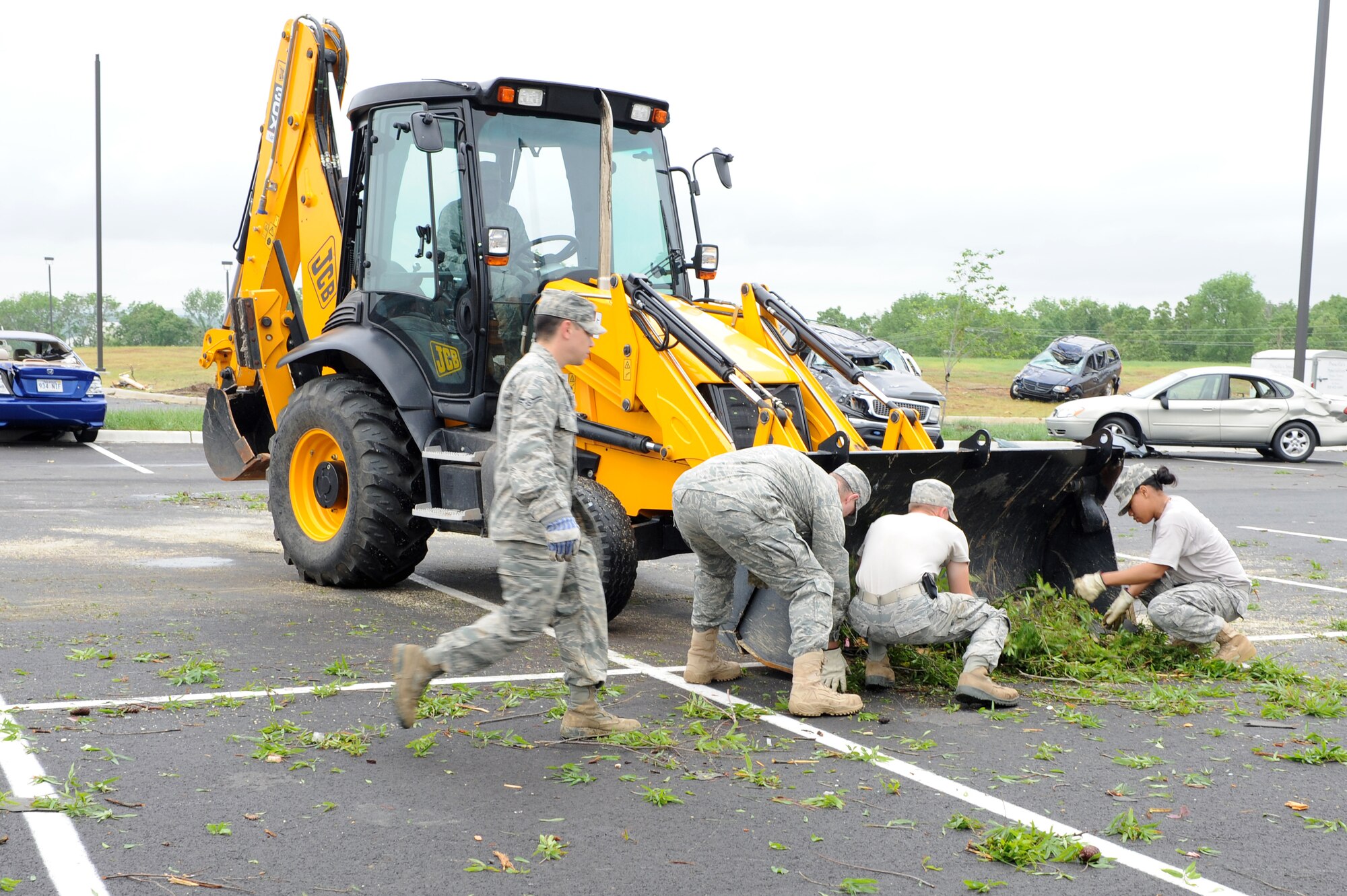 Members of Team Little Rock respond to a real-world natural disaster April 26, 2011, at Little Rock Air Force Base, Ark. A tornado struck the base at approximately 8 p.m. April 25.  (U. S. Air Force photo by Airman 1st Class Ellora Stewart)