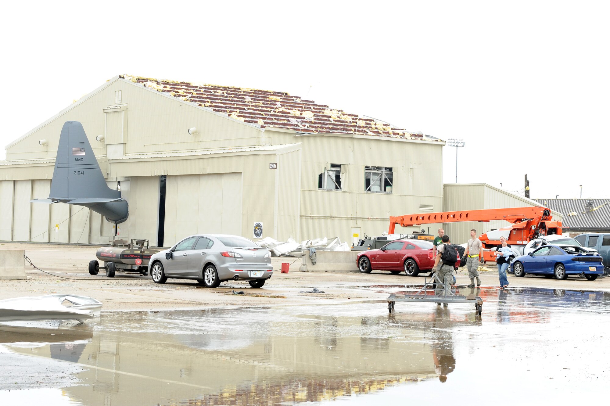 Members of Team Little Rock respond to a real-world natural disaster April 26, 2011, at Little Rock Air Force Base, Ark. A tornado struck the base at approximately 8 p.m. April 25.  (U. S. Air Force photo by Airman 1st Class Ellora Stewart)