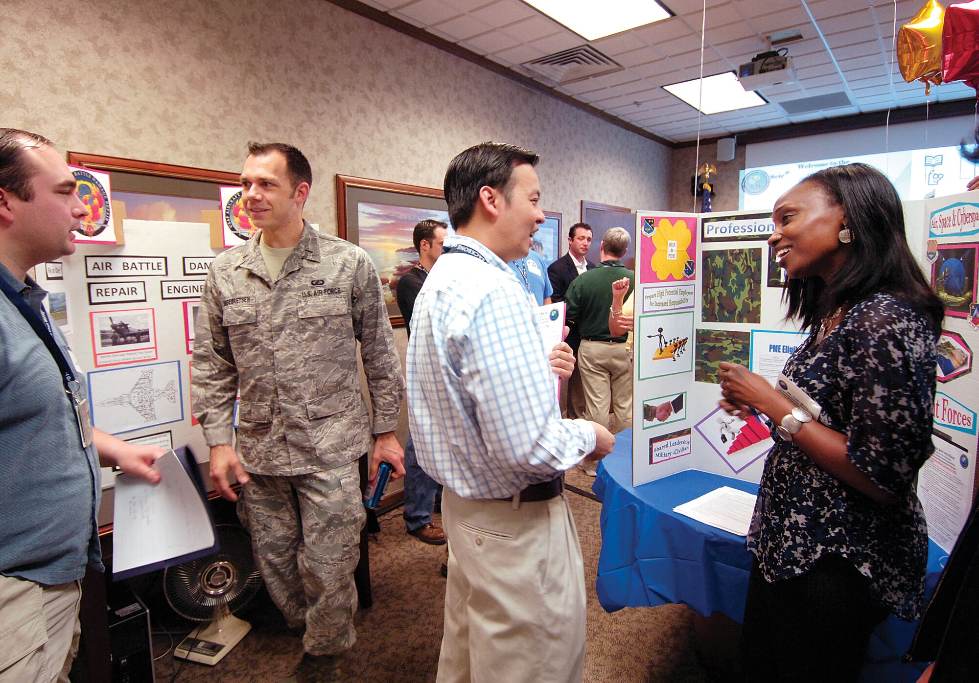 The second Engineering Open House April 15 attracted approximately 250 scientists and engineers to learn more about career and educational opportunities available to them.  The Workforce Development Branch of the Engineering and Technical Management Directorate is a one-stop location for Tinker’s 1400 engineers and scientists to get  help with their career development needs. (Air Force photo by Margo Wright)
