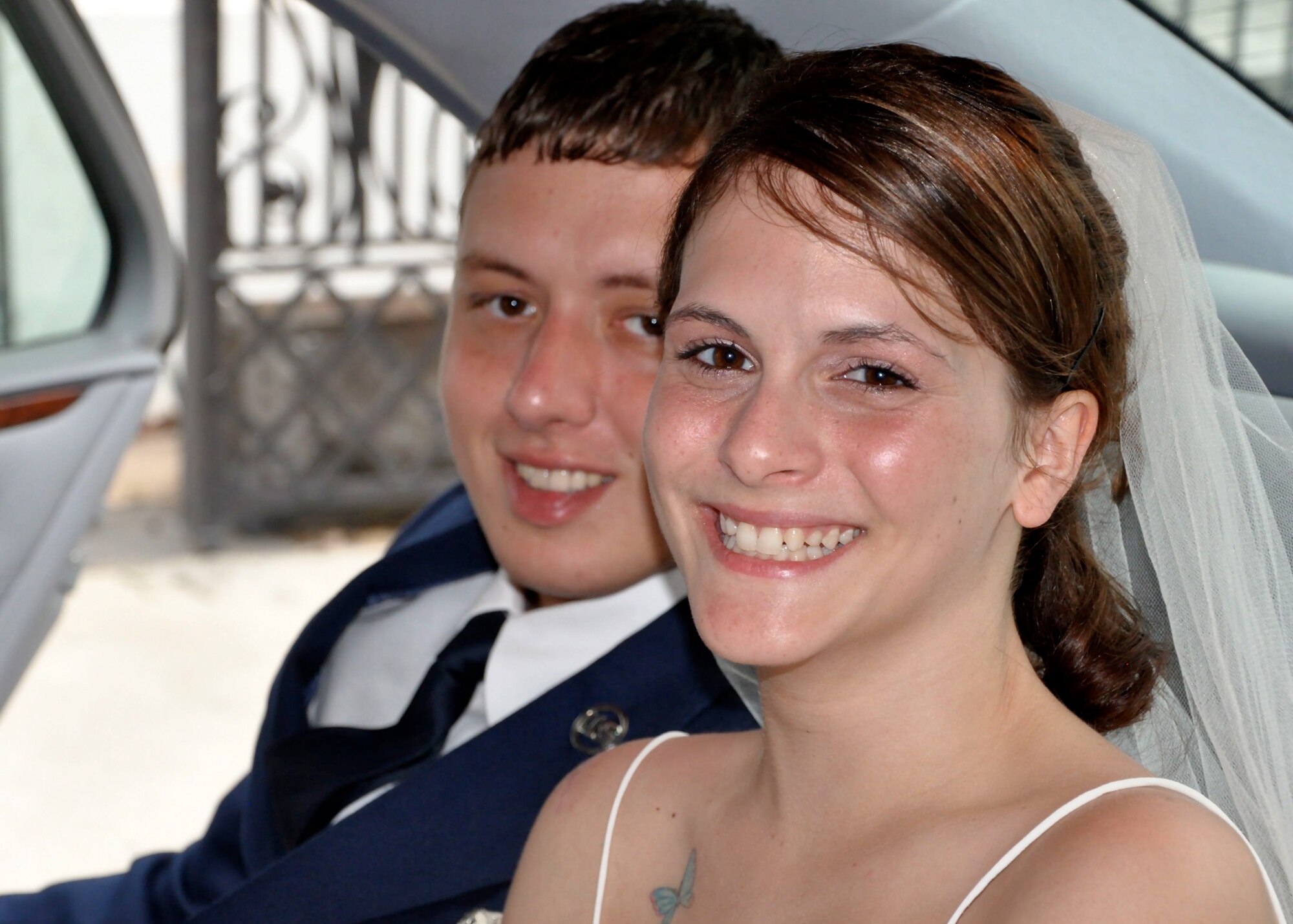BUCKLEY AIR FORCE BASE, Colo. -- Shown is the dauther of Lt. Col. Kelly Kanapaux, 460th Communications Squadron, and her fiancé on their wedding day. After a long struggle with physical therapy, after being hit by a suspected drunk driver, she was bound and determined to walk down the aisle.(Photo courtesy of Lt. Col. Kelly Kanapaux)
