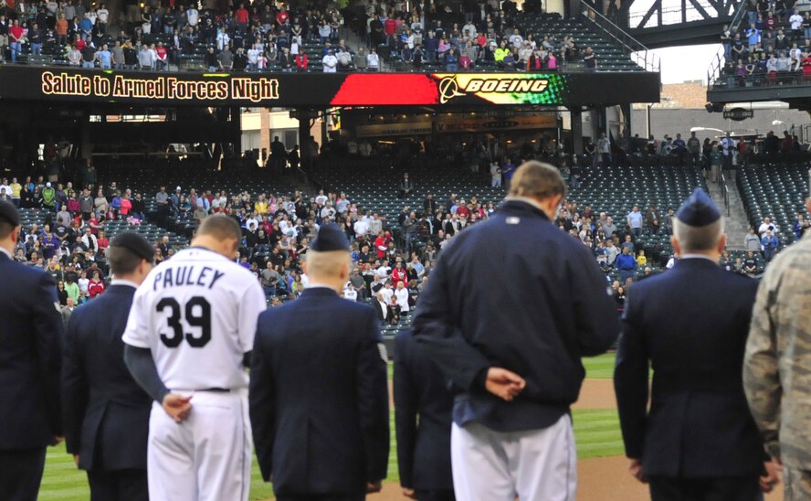 The crowd pauses during the National Anthem before the annual Seattle Mariners Salute to the Troops night April 23 at Safeco Field, Seattle, Wash. (U.S. Air Force photo/Airman 1st Class Leah Young)