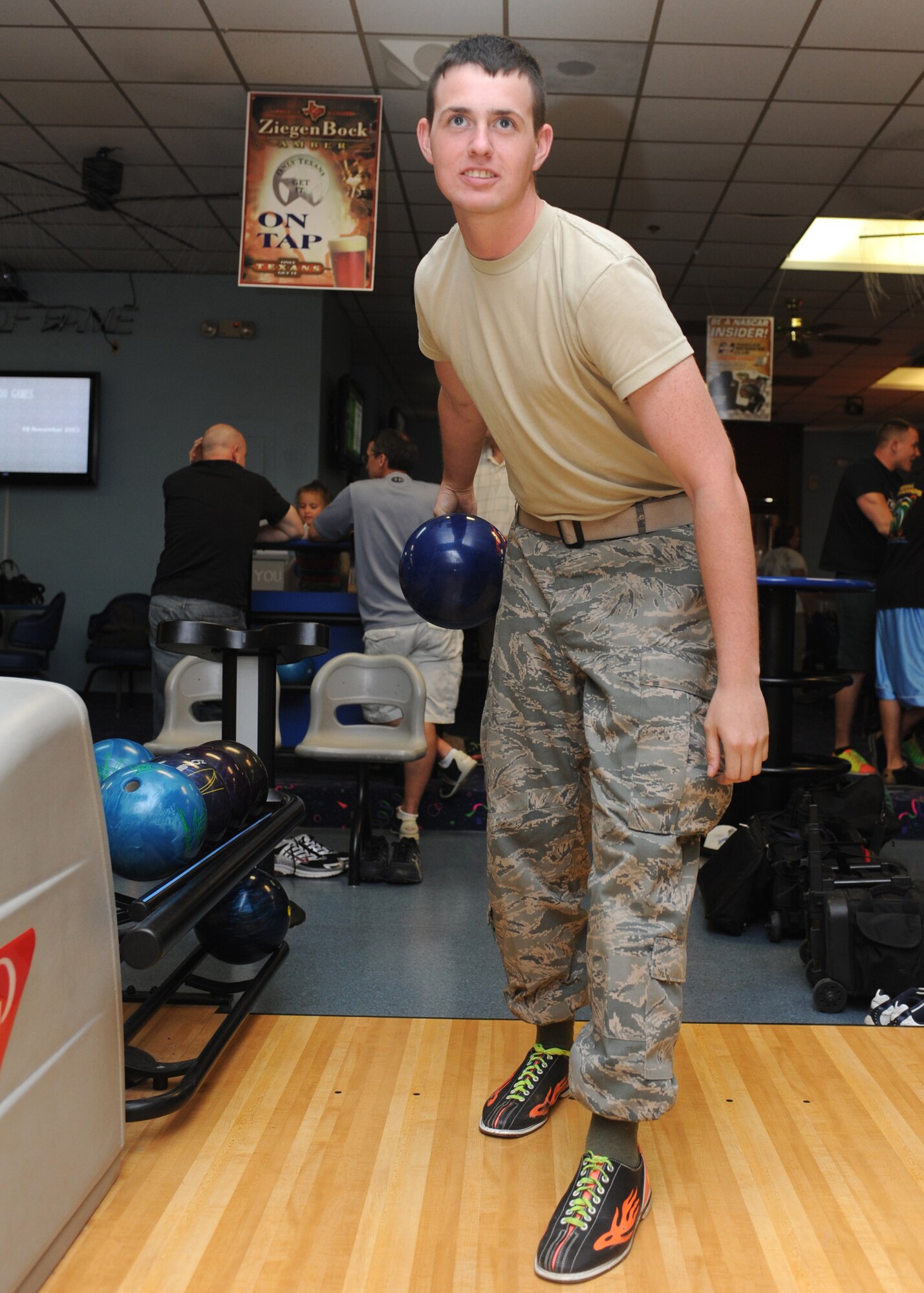DYESS AIR FORCE BASE, Texas -- Airman 1st Class Kyle Nall, 7th Munitions Squadron, bowls April 20 at Dyess Lanes bowling alley here.  Airman Nall made Dyess history by becoming the first person to score a 300 while using a house ball and shoes during a sanctioned intramural league Feb. 23. (U.S. Air Force photo/Airman 1st Class Jenifer H. Calhoun)