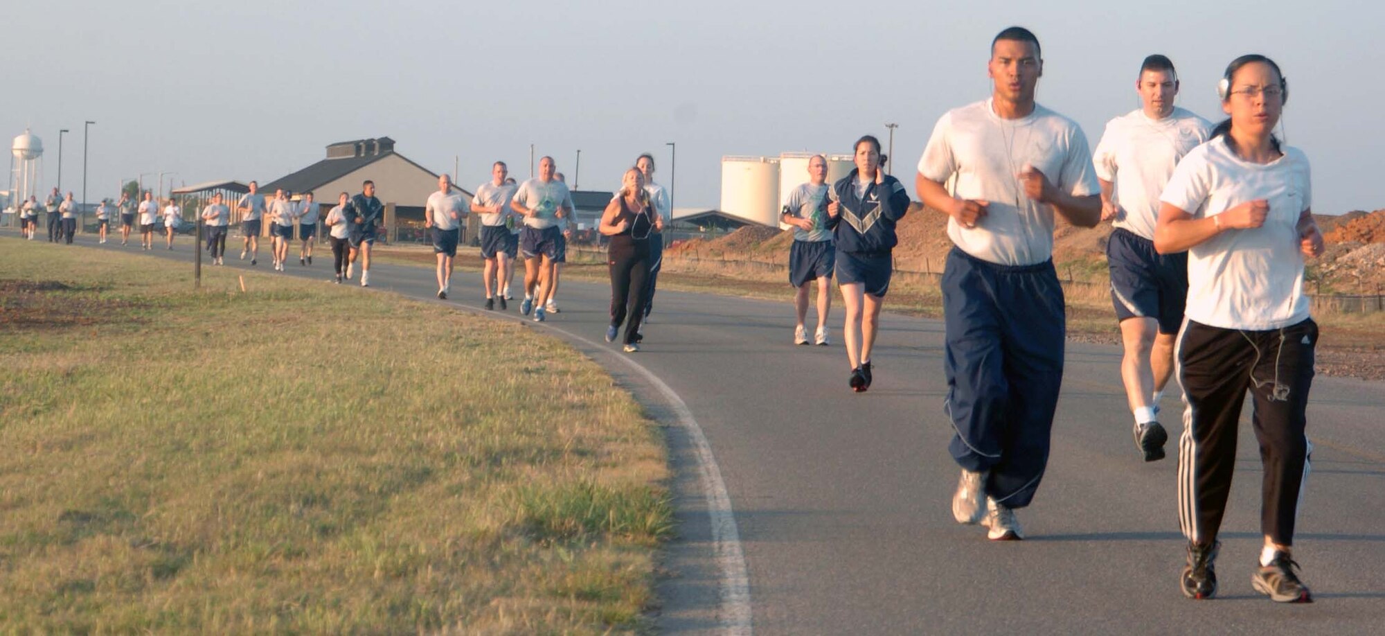 ALTUS AIR FORCE BASE, Okla. – Members of the 97th Air Mobility Wing run in the Earth Day 5K and 10K Fun Run April 22 to celebrate the 41 annual Earth Day. The Air Force joined millions of people around the world with its theme, Conserve Today – Secure Tomorrow, to reflect and build a more sustainable Air Force and world environment.  
(U.S. Air Force photo by Kenneth Scarle/97th Air Mobility Wing Public Affairs) 