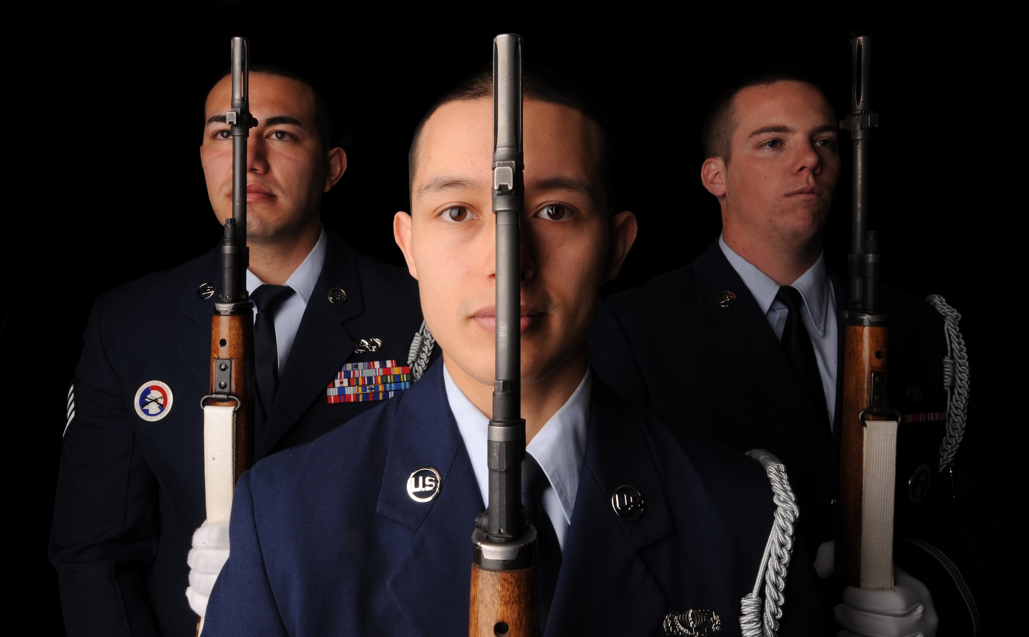 MOUNTAIN HOME AIR FORCE BASE, Idaho – Airmen from the 366th Fighter Wing honor guard pose with their rifles March 22. With a vision to promote the mission, protect the standards, perfect the image and preserve the heritage; members of the honor guard embody the words honor and respect. In order for the base honor guard program to function properly, a minimum of 35 people is required. Due to current deployments and temporary duty assignments the base honor guard has 23 available members. Applications to join the base honor guard can be picked up from your first sergeant. (U.S. Air Force illustration by Senior Airman Debbie Lockhart)