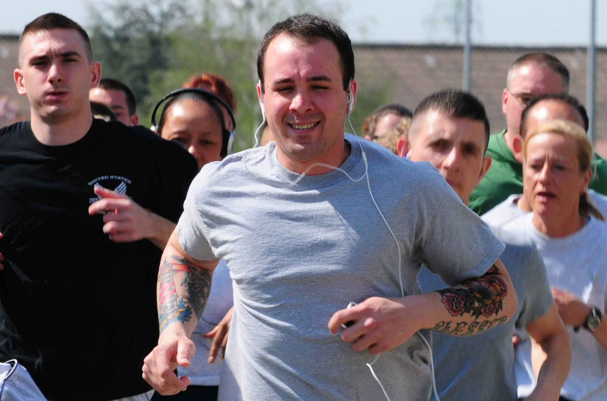 SPANGDAHLEM AIR BASE, Germany — Participants take off from the starting line during a 5k run here April 20. The run was held to promote sexual assault awareness and Earth Day Awareness among Airmen and families. (U.S. Air Force photo/Airman 1st Class Dillon Davis)