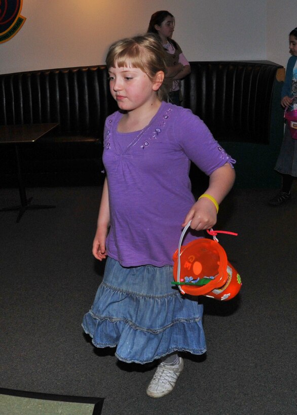 Members of the 914th and 107th Airlift Wings and their families participate in the Children's Easter Egg Hunt at the Niagara Falls Air Reserve Station Falcon Club, April 23, 2010, Niagara Falls NY. The egg hunt was held inside the Falcon Club where candy filled plastic eggs were hidden for the children to find. (U.S. Air Force photo by Staff Sgt. Joseph McKee)