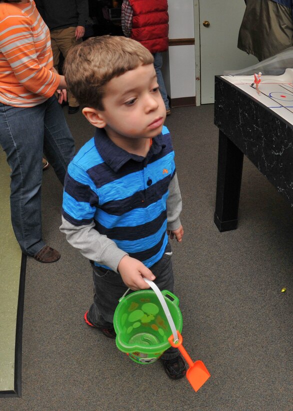 Members of the 914th and 107th Airlift Wings and their families participate in the Children's Easter Egg Hunt at the Niagara Falls Air Reserve Station Falcon Club, April 23, 2010, Niagara Falls NY. The egg hunt was held inside the Falcon Club where candy filled plastic eggs were hidden for the children to find. (U.S. Air Force photo by Staff Sgt. Joseph McKee)