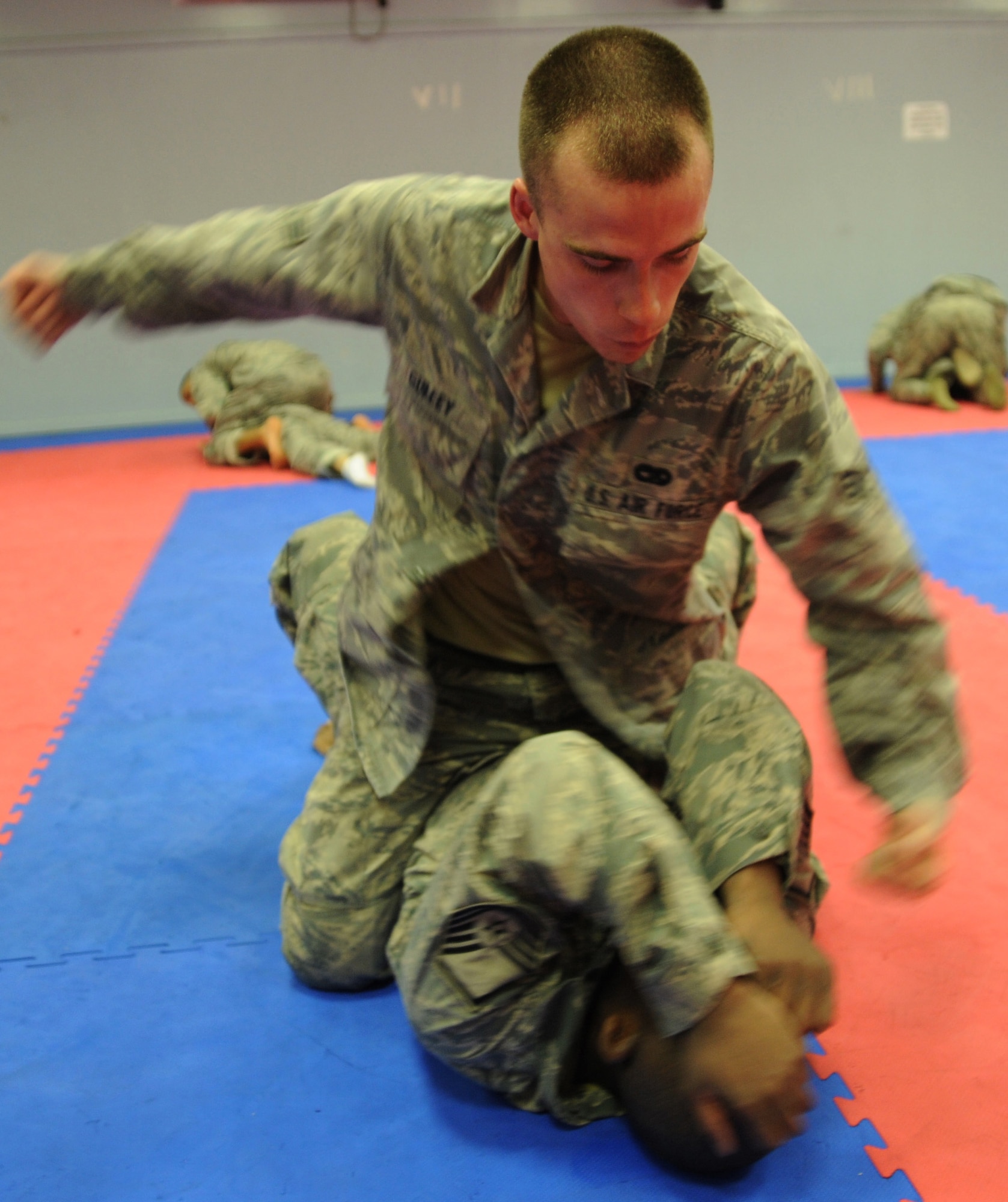 JOINT BASE BALAD, Iraq--Senior Airman Travis Gulley, 332nd Expeditionary Logistics Readiness Squadron air transportation journeyman, practices defense tactics during combat skills course April 22, 2011. Coaches from the U.S. Air Force Academy came here to teach the five-day course. (U.S. Air Force photo/ Staff Sgt. Keyonna Fennell)