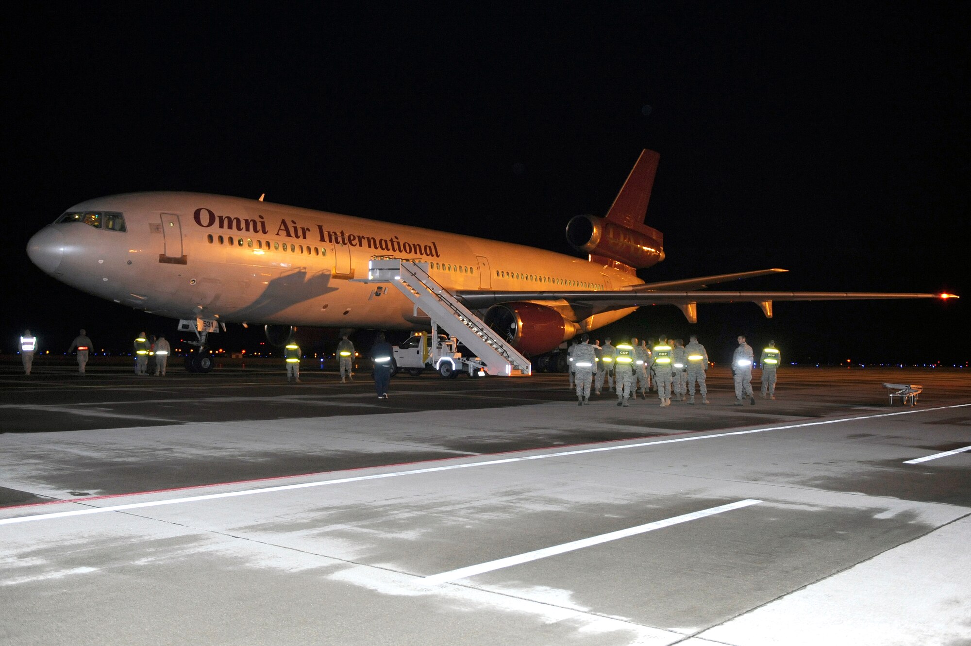 MISAWA AIR BASE, Japan -- A McDonnell Douglas DC-10, dubbed the "patriot express" arrives April 25. This was the last of three chartered flights acquired to bring back dependents from Misawa who participated in the Department of State-approved voluntary departure program for families affected by the March 11 earthquake. (U.S. Air Force photo by Staff Sgt. Marie Brown\Released)
