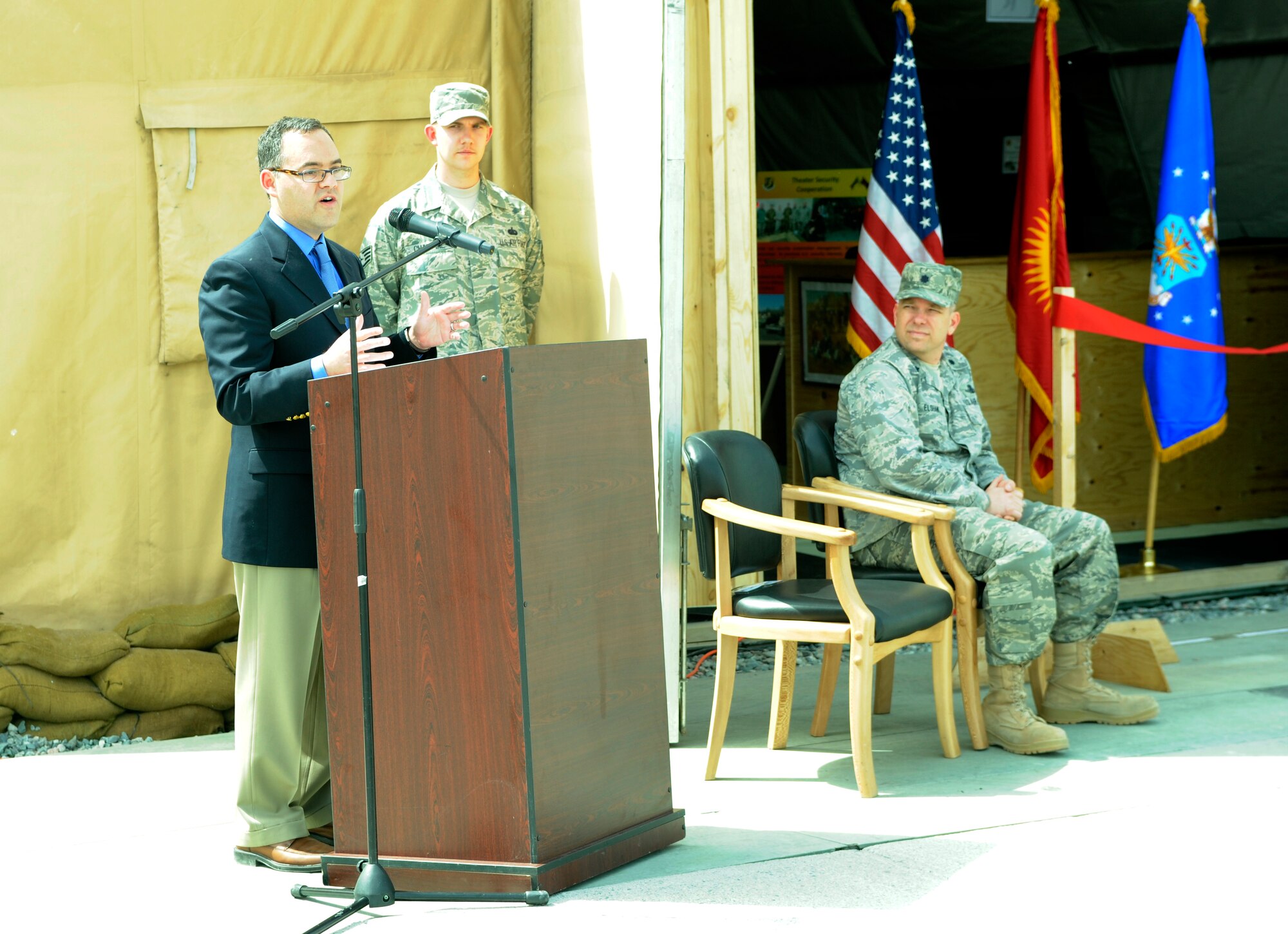 TRANSIT CENTER AT MANAS, Kyrgyzstan -The Honorable Daniel Ginsberg, Assistant Secretary of the Air Force for Manpower and Reserve Affairs, gives a brief overview of the Theater Security Cooperation Division operations during the stand up ceremony here April 23.  Secretary Ginsberg also toured the transit center to take a look at the day-to-day operations and held an "All Call" in Pete's Place to answer questions from transit center Airmen. (U.S. Air Force photo/Tech. Sgt. Jerome C. Baysmore)