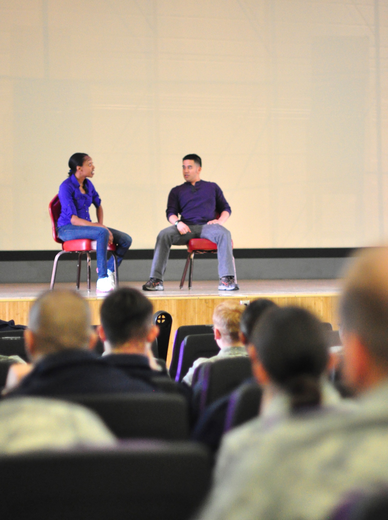 Sharyon Culberson and Pogi Sumangil, both professional actors, perform during the show, "Sex Signals" at Osan's base theater April 25 and 26. The show was brought to the base to help align with a recent policy signed by the Secretary of the Air Force and Air Force Chief of Staff to eliminate sexual assault from the Air Force. "Sex Signals" presents a series of various dating scenes performed by professional actors who bring realistic circumstances to life and allow Airmen to learn about sexual assault in a "lively and humorous" way. (U.S. Air Force photo/Staff Sgt. Chad Thompson)