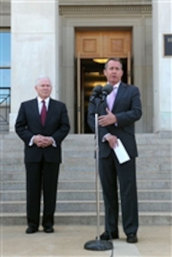 Secretary of Defense Robert M. Gates conducts a joint press conference with British Secretary of State for Defense Liam Fox on the steps of the Pentagon on April 26, 2011.  