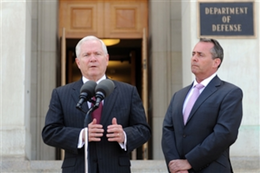 Secretary of Defense Robert M. Gates conducts a joint press conference with British Secretary of State for Defense Liam Fox on the steps of the Pentagon on April 26, 2011.  