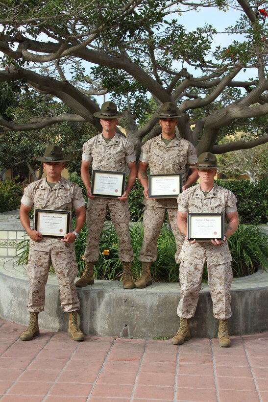 Drill Instructors of the Year for Marine Corps Recruit Depot San Diego, from left, Staff Sgt. Michael Saldana, drill master, 1st Battalion; Staff Sgt. Kristopher Consiglio, Company H drill instructor, 2nd Battalion; Staff Sgt. Levi Fajardo, Company L drill instructor, 3rd Battalion; and Staff Sgt. Matthew McNulty, chief instructor of Academic Instruction Platoon, Intstructional Training Company, Support Battalion were recognized by the MCRD Museum Historical Society April 26.