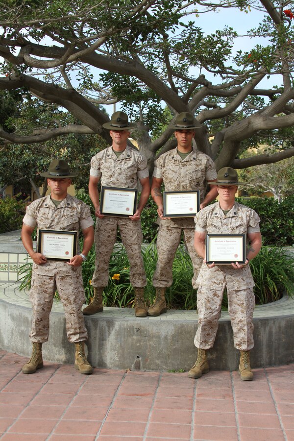 Drill Instructors of the Year for Marine Corps Recruit Depot San Diego, from left, Staff Sgt. Michael Saldana, drill master, 1st Battalion; Staff Sgt. Kristopher Consiglio, Company H drill instructor, 2nd Battalion; Staff Sgt. Levi Fajardo, Company L drill instructor, 3rd Battalion; and Staff Sgt. Matthew McNulty, chief instructor of Academic Instruction Platoon, Intstructional Training Company, Support Battalion were recognized by the MCRD Museum Historical Society April 26.