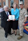 General James Amos, Commandant of the Marine Corps, presents Dick and Marguerite Govoni with a certificate representing Dick’s 60 years of service to the Marine Corps, both as an active-duty Marine and a Civilian Marine. Govoni works in Marine Corps Systems Command's Life Cycle Logistics office.