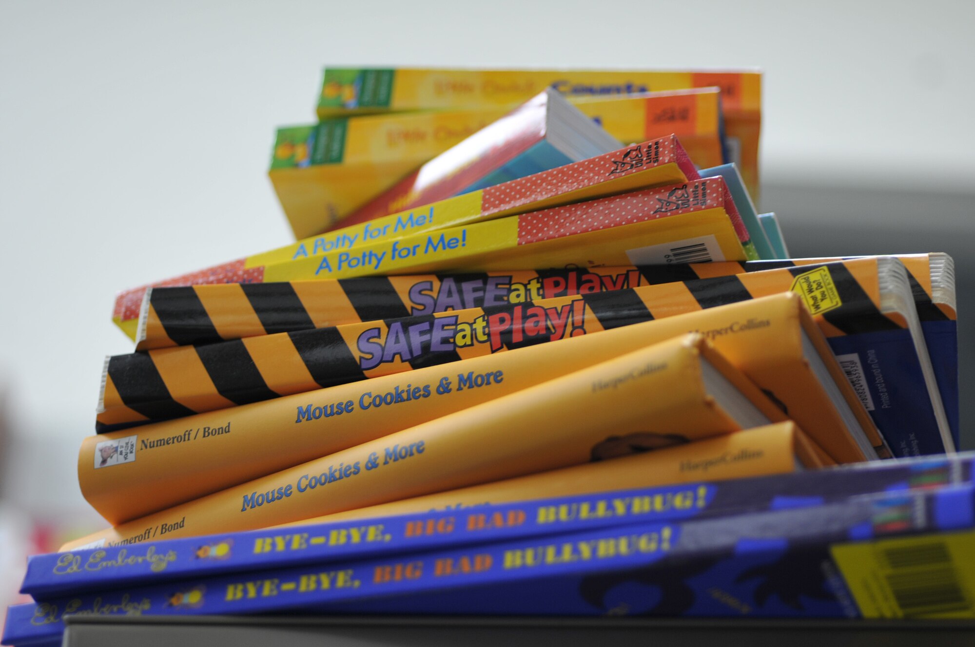 YOKOTA AIR BASE, Japan -- A stack of books sits on a supply shelf April 27, 2011, at the 374th Medical Operations Squadron Pediatric Clinic at Yokota. The books were donated by the Reach Out and Read Program headquarters in Boston, Mass., to promote early literacy, childhood developement and improved listening and hearing skills in Yokota children starting May 2. (U.S. Air Force photo/Airman John Partlow)