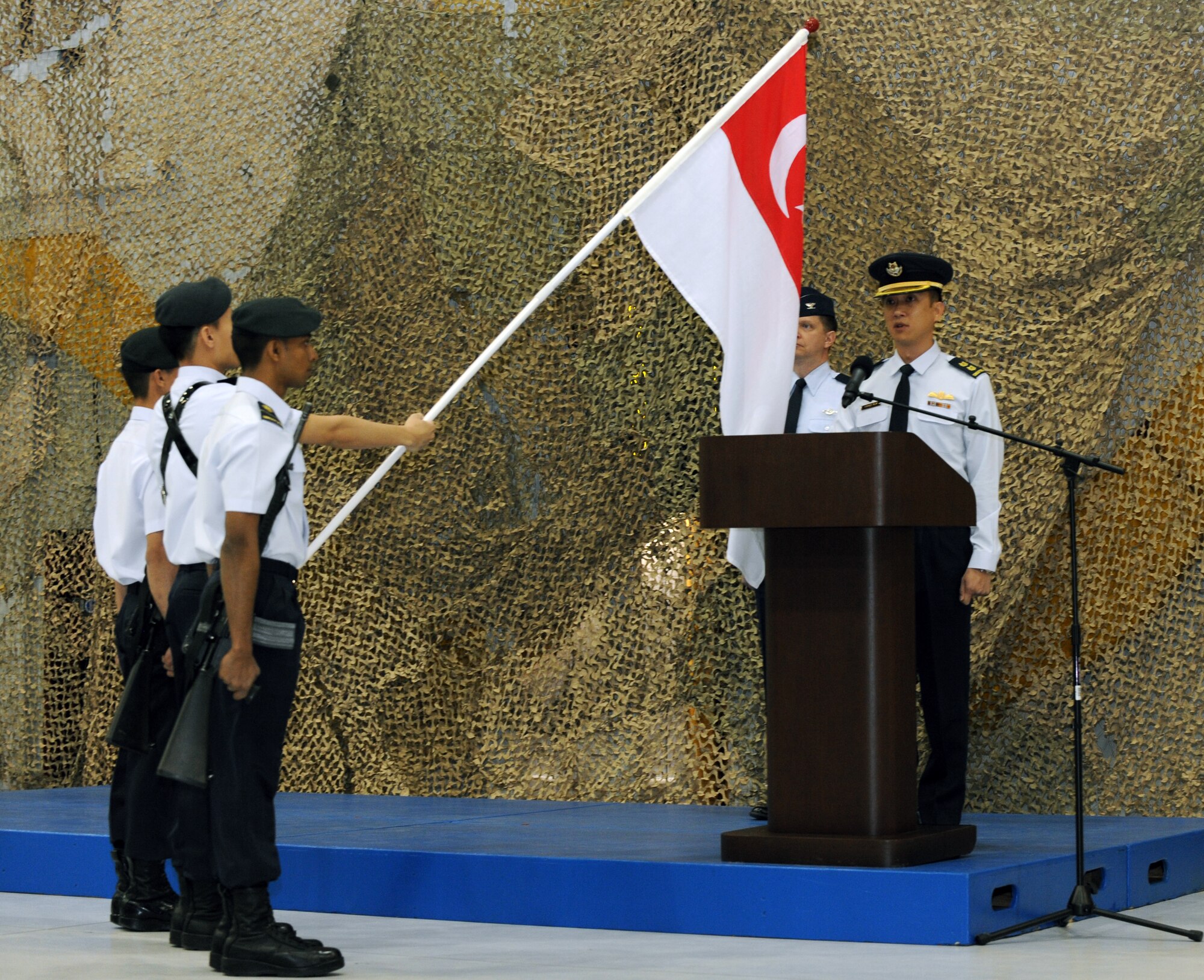 MOUNTAIN HOME AIR FORCE BASE, Idaho -- Lt. Col. Linus Tan Jin Kiat takes the oath of appointment during a Change of Appointment Ceremony held in hangar 1329, April 15. Lt. Col. Linus Tan Jin Kiat assumed the appointment of senior Republic of Singapore air force officer  of the Peave Carvin V detachment. (U.S. Air Force photo by Senior Airman Debbie Lockhart)