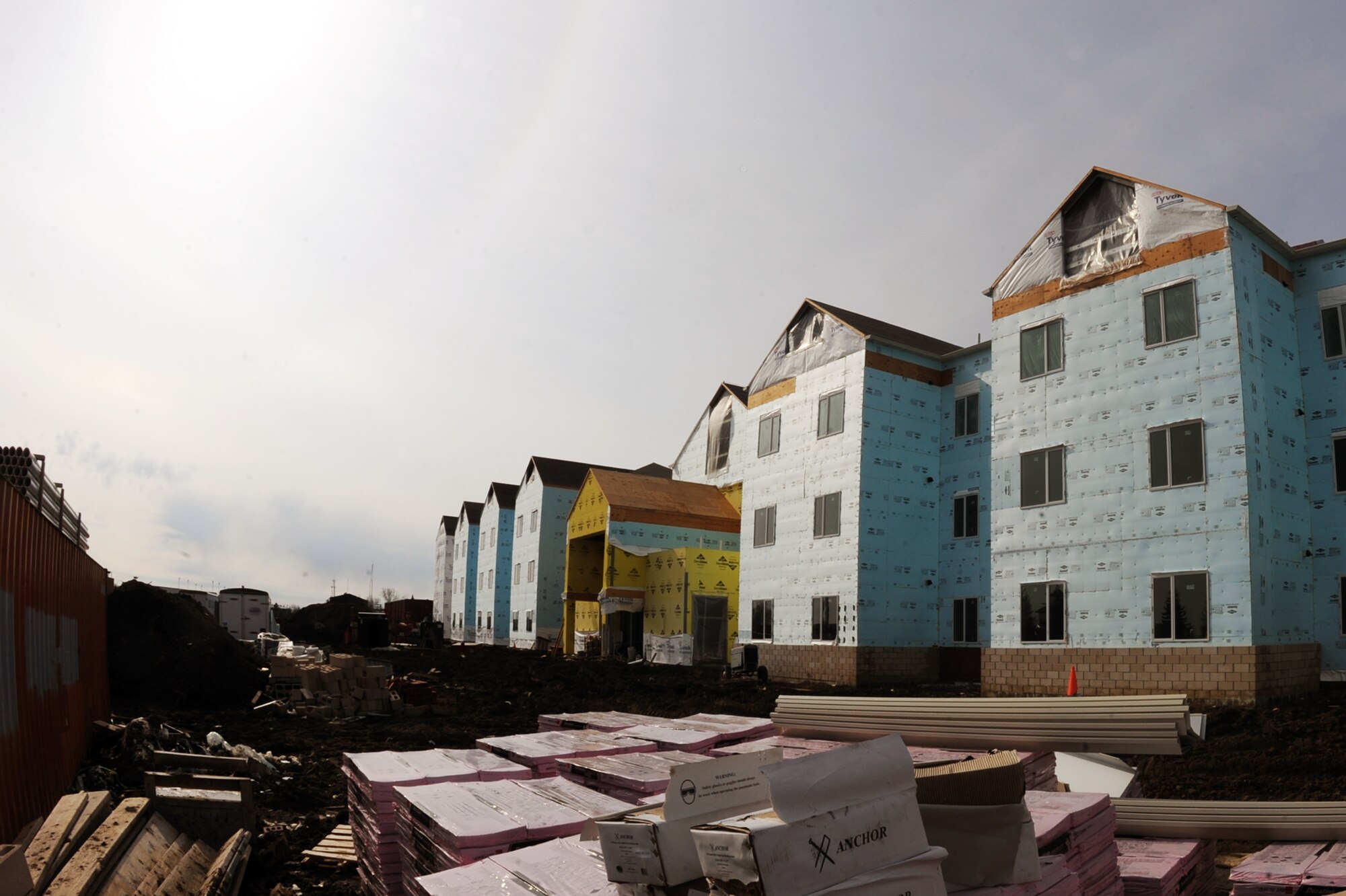 MINOT AIR FORCE BASE, N.D. -- Construction of the new dormitory is well underway in the insulation process here April 27. Construction projects like this help foster a better quality of life for Air Force Global Strike Command Airmen here. (U.S. Air Force photo/Senior Airman 1st Class Aaron-Forrest Wainwright)