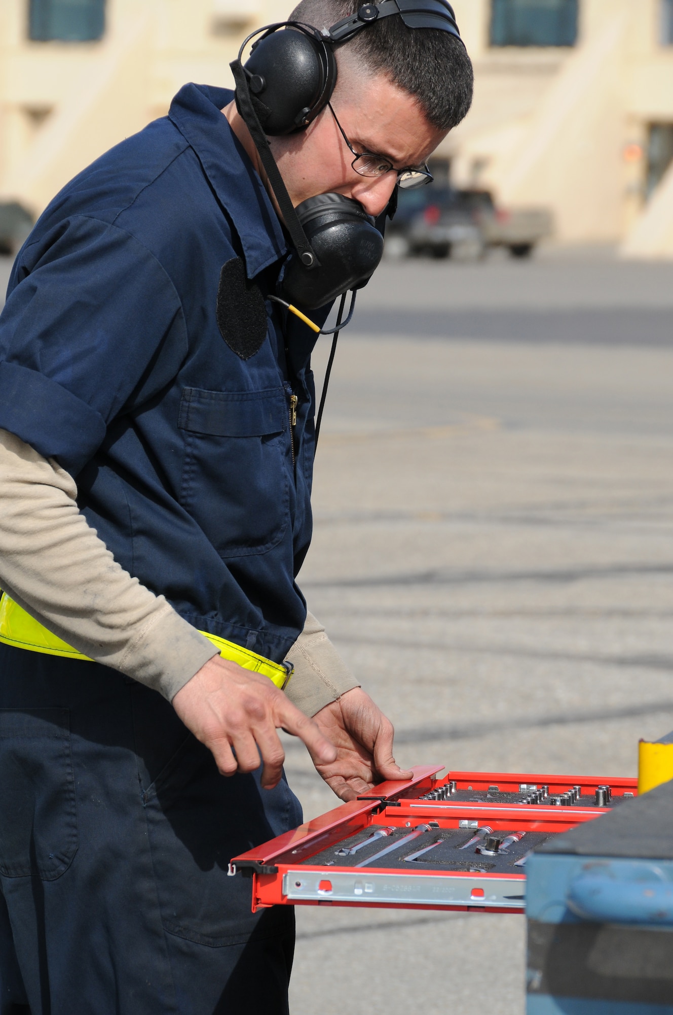 Staff Sgt. Justin Baldivia performs tools accountability after his pre-flight inspection April 25, 2011, Eielson Air Force Base, Alaska. All tools must be accounted for before and after each flight to minimize potential foreign object damage incidents on the flightline. Sergeant Baldivia is a crew chief assigned to the 80th Aircraft Maintenance Unit, Kunsan Air Base, Korea. (U.S. Air Force photo/Senior Airman Rachelle Coleman)