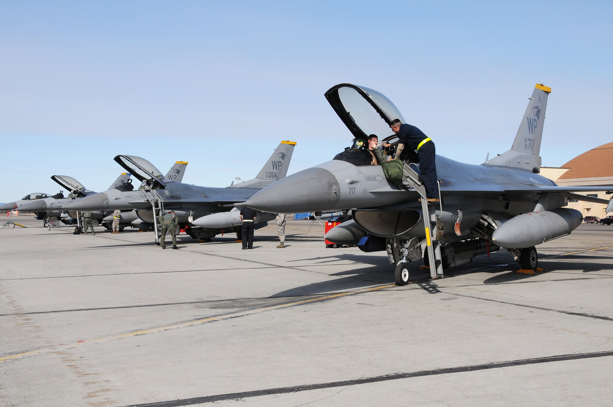Crew chiefs from Kunsan Air Base, Korea help their aircrew prepare for their afternoon sortie April 25, 2011, Eielson Air Force Base, Alaska. The work completed by crew chiefs provide mission capable aircraft for pilots so they can provide air support, serving as a vital role in the overall RED FLAG-Alaska mission. RF-A is a Pacific Air Forces-directed field training exercise for U.S. and coalition forces flown under simulated air-combat conditions. (U.S. Air Force photo/Senior Airman Rachelle Coleman)