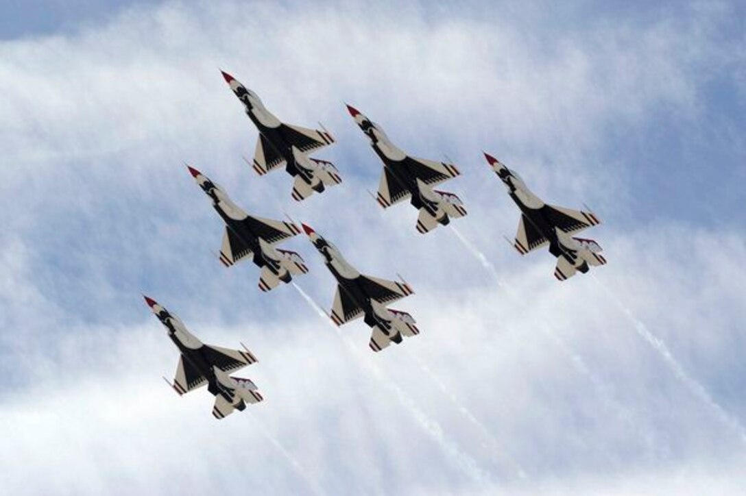 The U.S. Air Force Air Demonstration Squadron "Thunderbirds" fly in the "Delta" formation during their acceptance performance for Gen. William Fraser, commander of Air Combat Command, at Nellis Air Force Base, Nev., March 10, 2011. The Thunderbirds will headline AirPower over Hampton Roads, Langley AFB's signature air show, May 13-15, 2011. (U.S. Air Force photo/Staff Sgt. Richard Rose, Jr.)