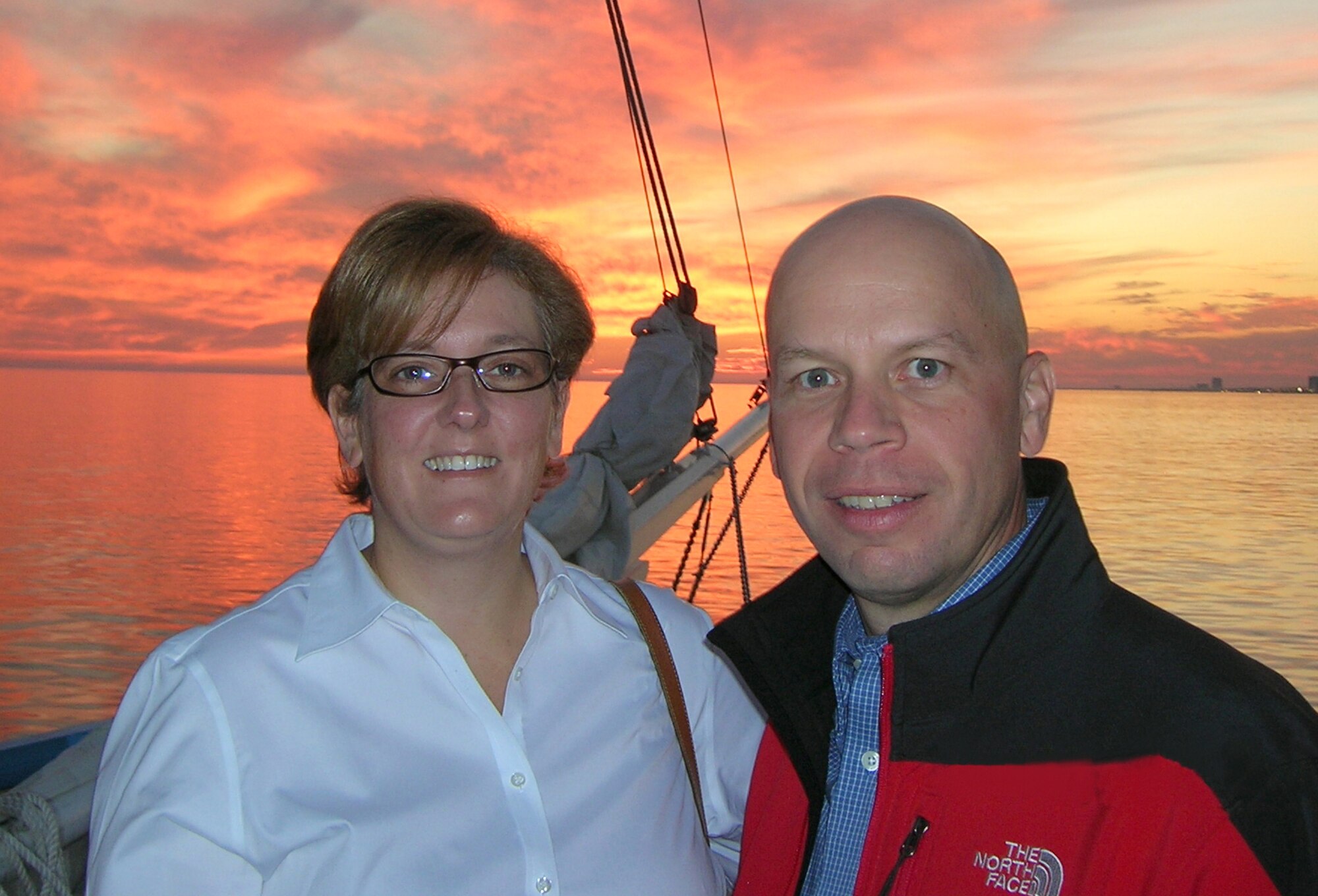 Colonel Downing and his wife, Vicki, enjoy a sunset sail on a Biloxi schooner hosted by the Biloxi Bay Chamber of Commerce.  Twelve other Keesler commanders participated in the Veterans Day event.  (Courtesy Photo)