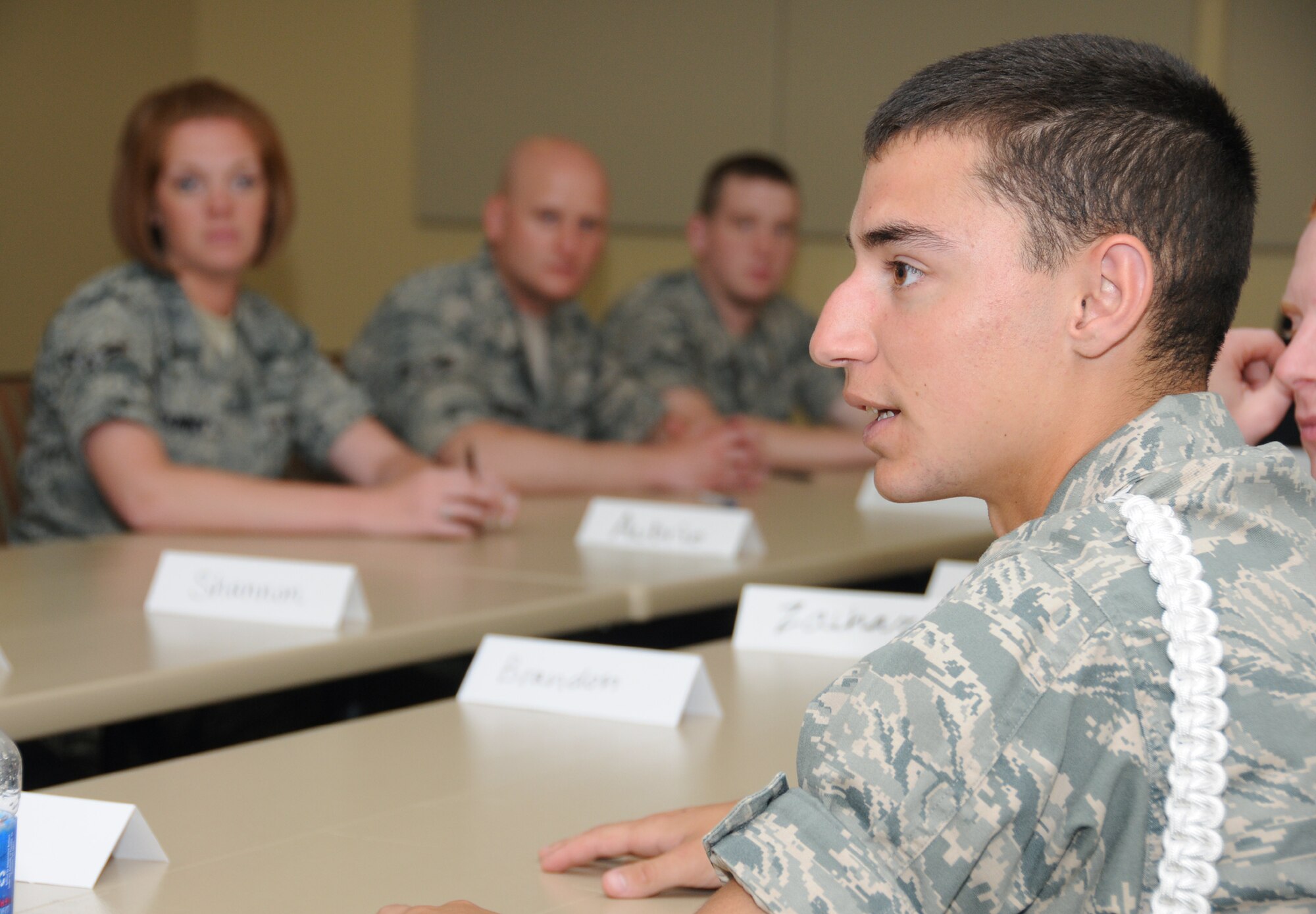Airman Basic Andrew Zoppi, a student in the 338th Training Squadron, expresses his opinion about the new Air Force motto, “Aim High ... Fly-Fight-Win” during one of two focus groups at the Bay Breeze Event Center, April 18. The two focus groups were conducted by Lt. Col. Clark Groves, chief of research and assessment for Air Force Public Affairs, to assess awareness and adoption of the new motto. The first group
was comprised of 12 military training leaders from the 81st Training Group. Airman Zoppi was one of 12 nonprior service students in the second group.  (U.S. Air Force photo by Kemberly Groue)